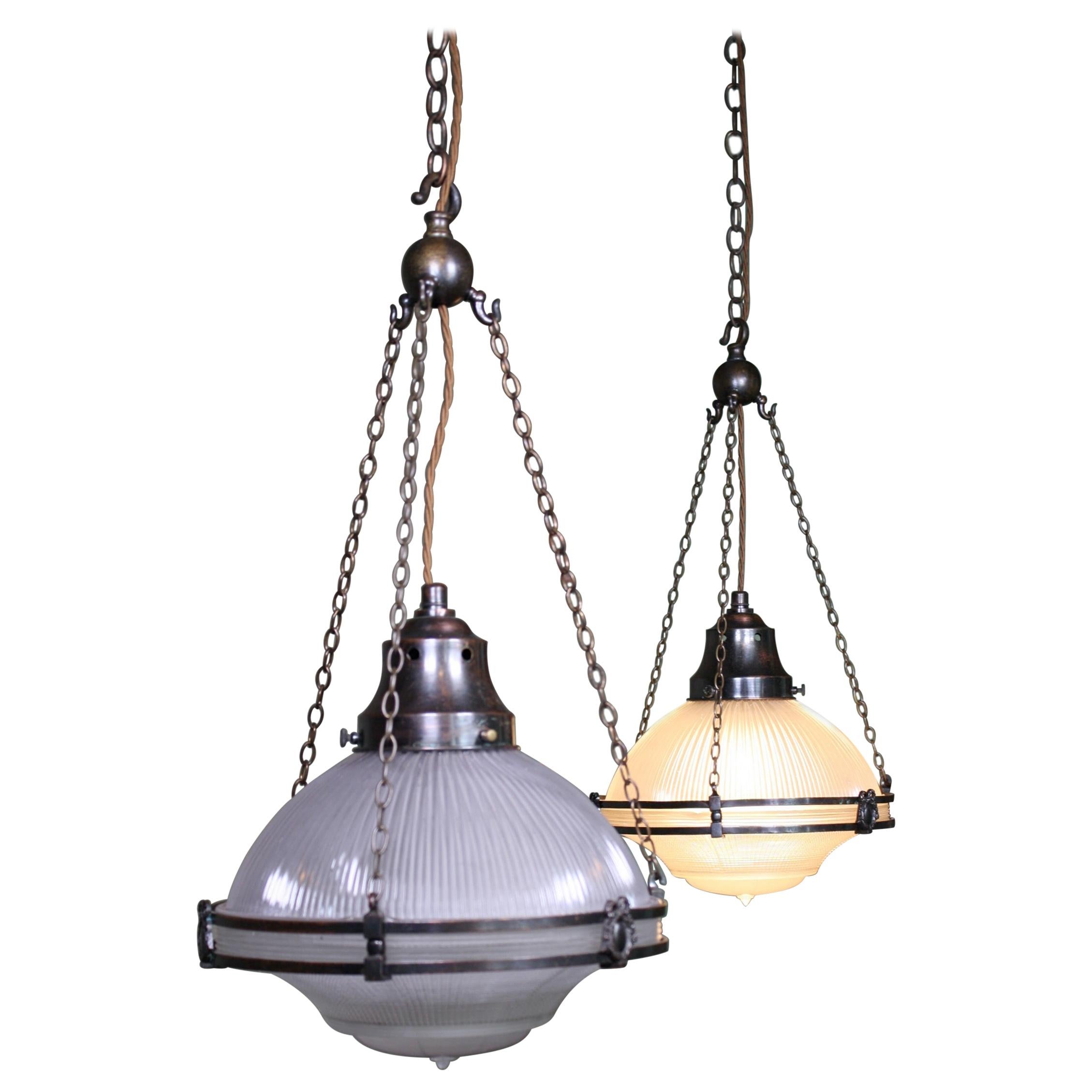 Pair of Large Holophane Prismatic Glass and Bronze Chandelier Lights