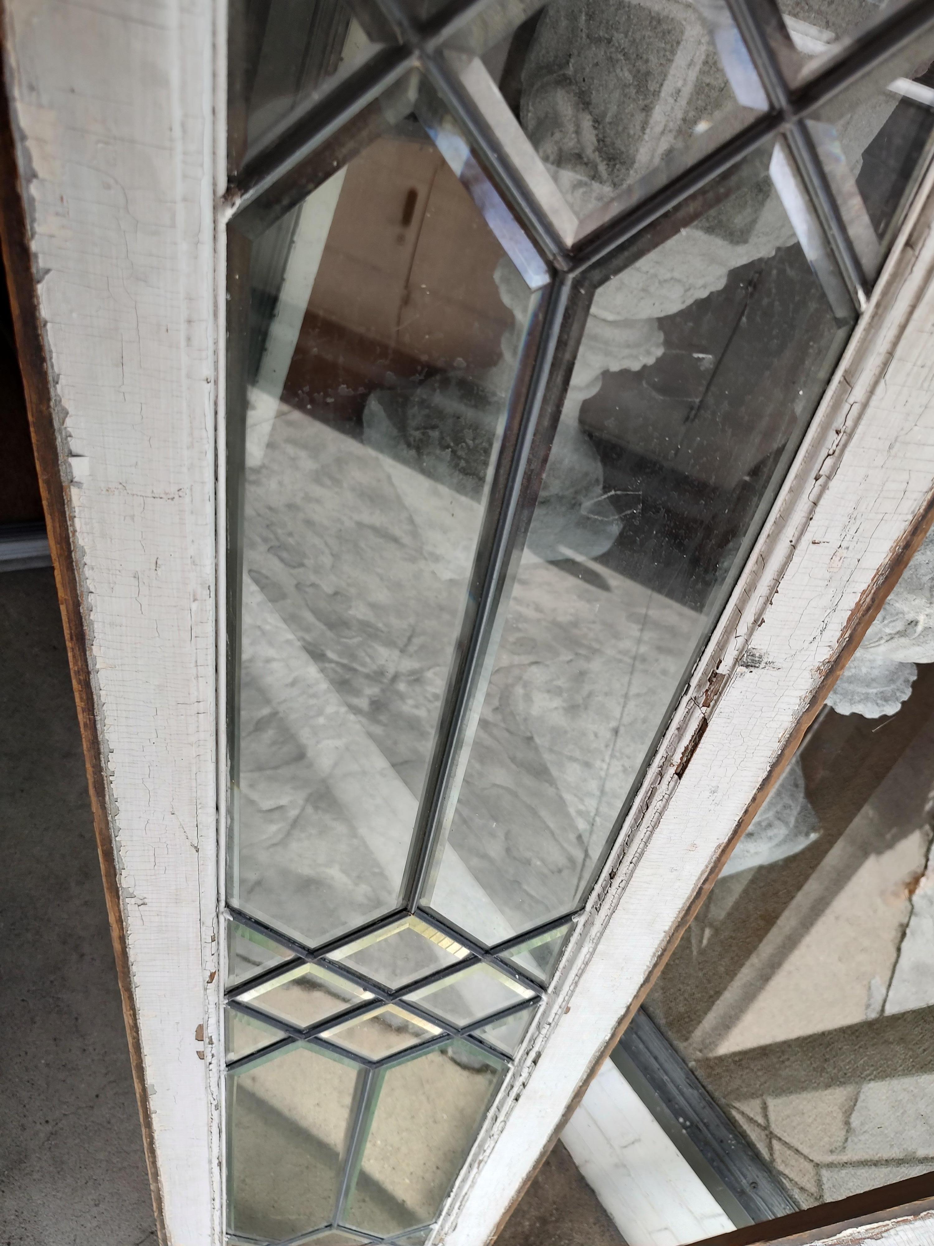 Fabulous pair of Early 20thc antique beveled Glass Sidelight Windows. In excellent antique condition with no damage at all. Glass is perfect. Wood frames are mortise and tenon construction. Old paint on both sides.
