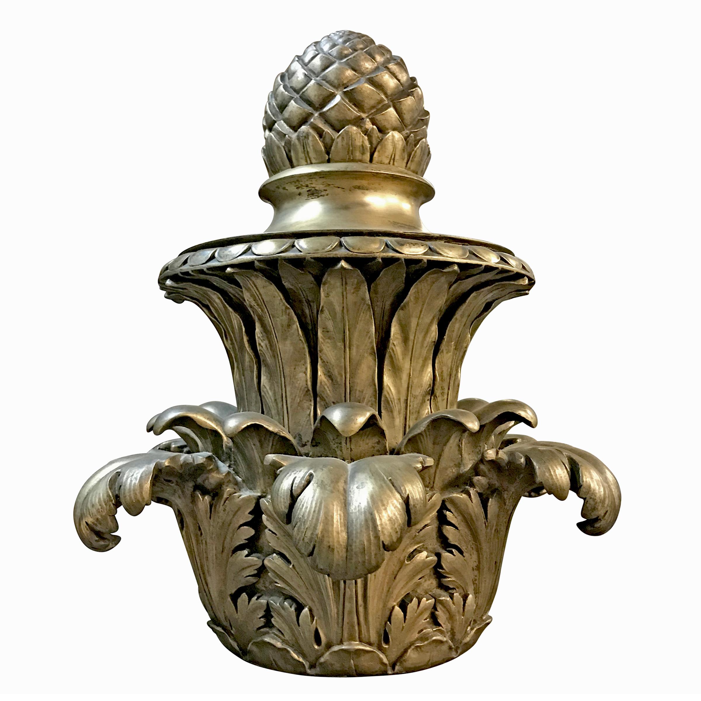 A fantastic pair of American nickel finished cast bronze acanthus leaf finials with pineapple tops, and wonderfully exaggerated leaves.