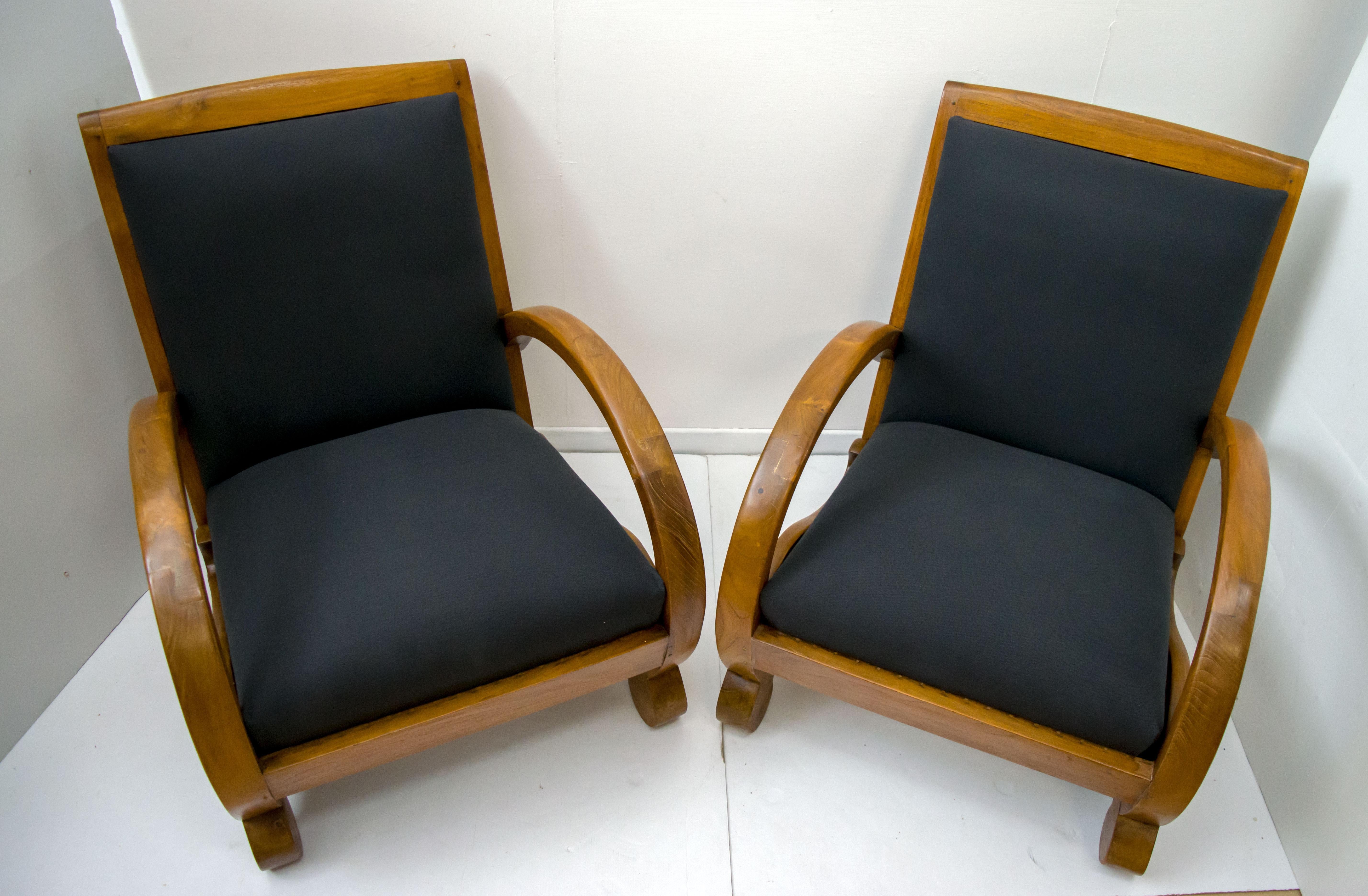 Pair of deco armchairs in Italian walnut from the early 1900s, covered in black fabric.