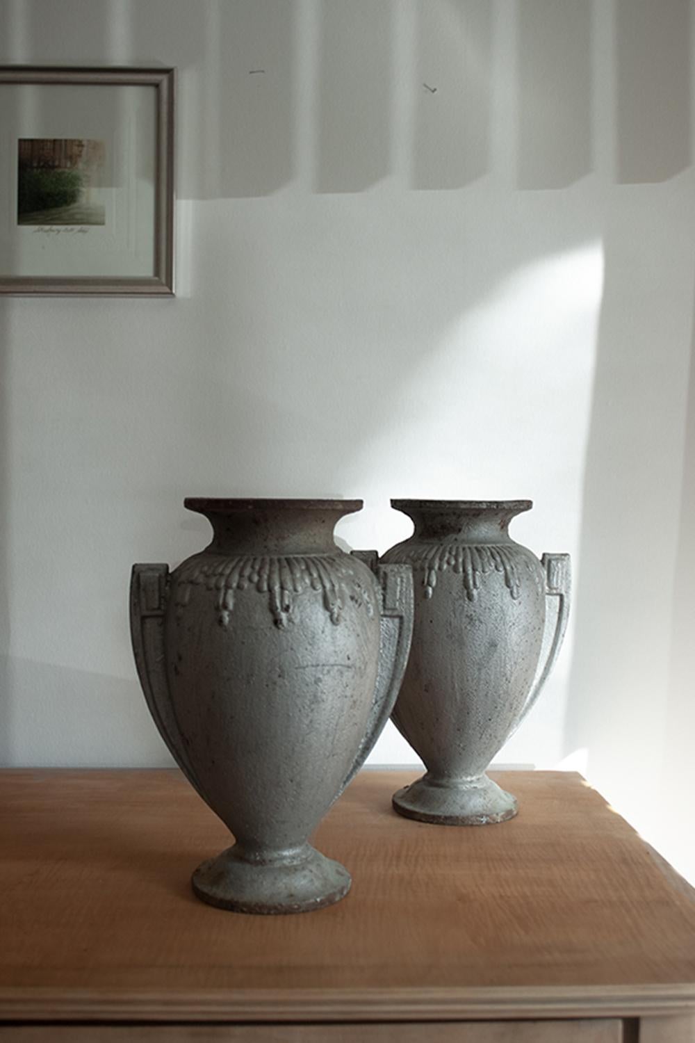 French Pair of 20th Century Art Deco Style Cast Iron Urns
