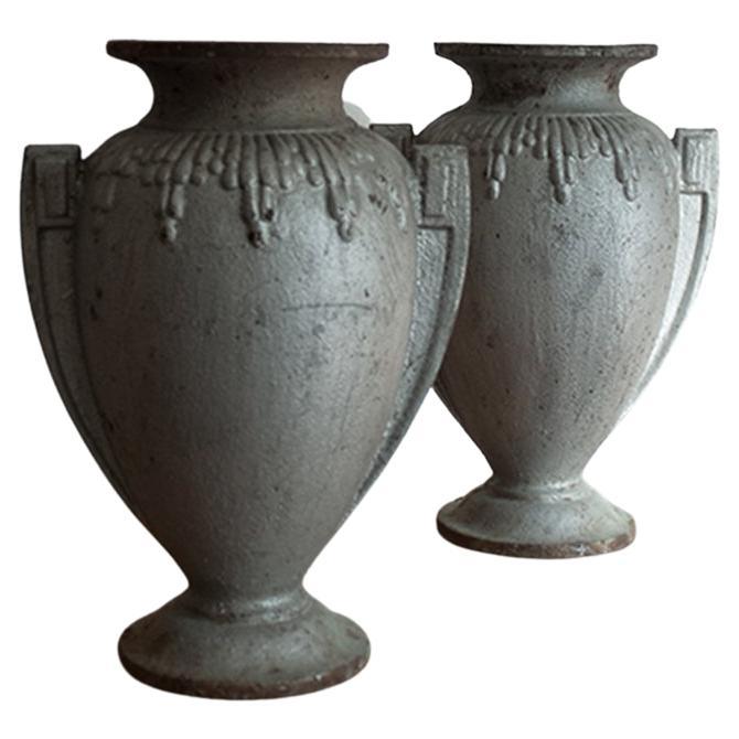 Pair of 20th Century Art Deco Style Cast Iron Urns