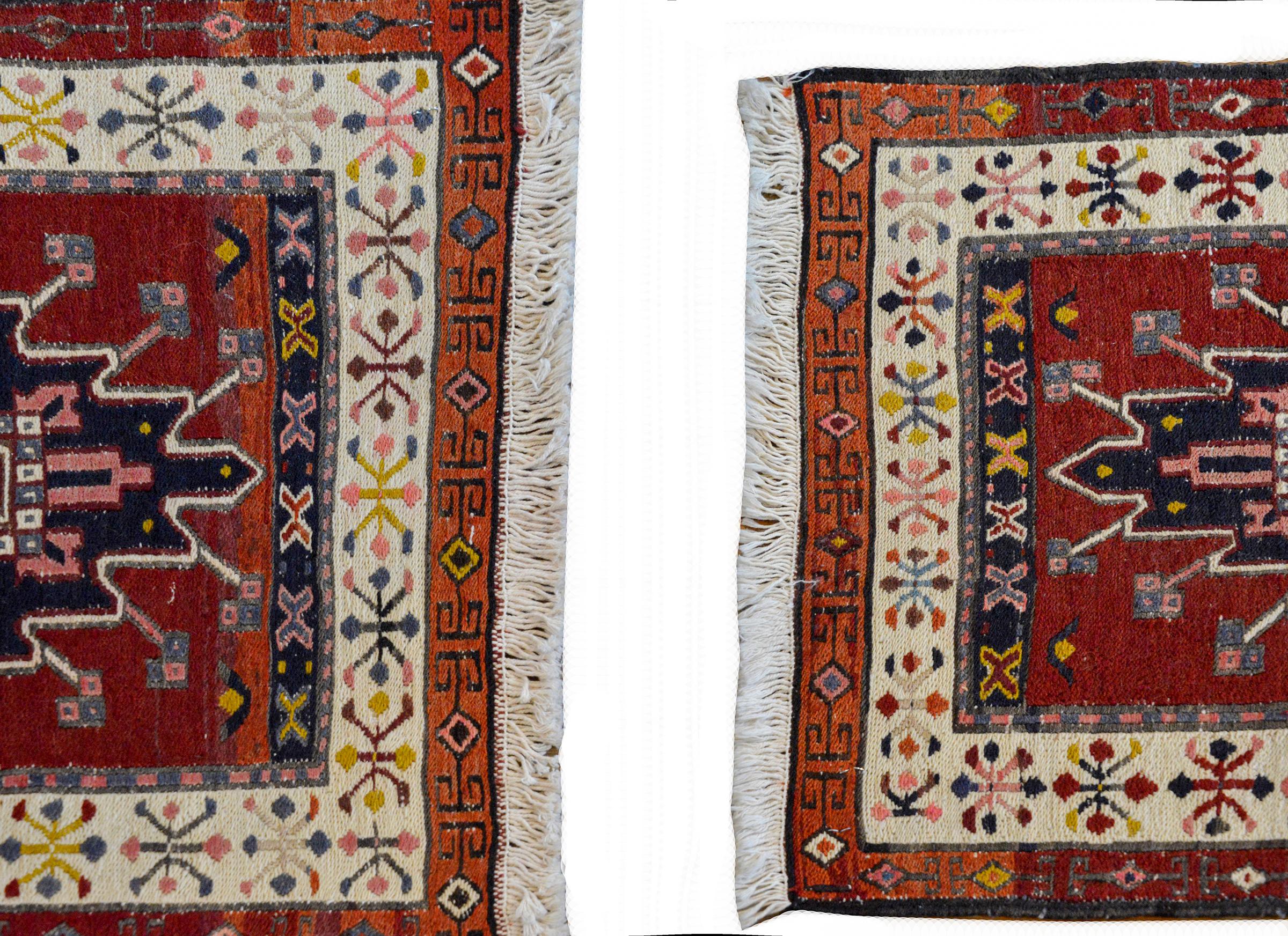A wonderful sweet pair of early 20th century Persian Bakhtiari bag face rugs, each with a geometric pattern. Please note the rugs are different sizes.

Measures: Smaller: 20in. W x 22. in L
Larger: 21 in. W x 22 in. L.