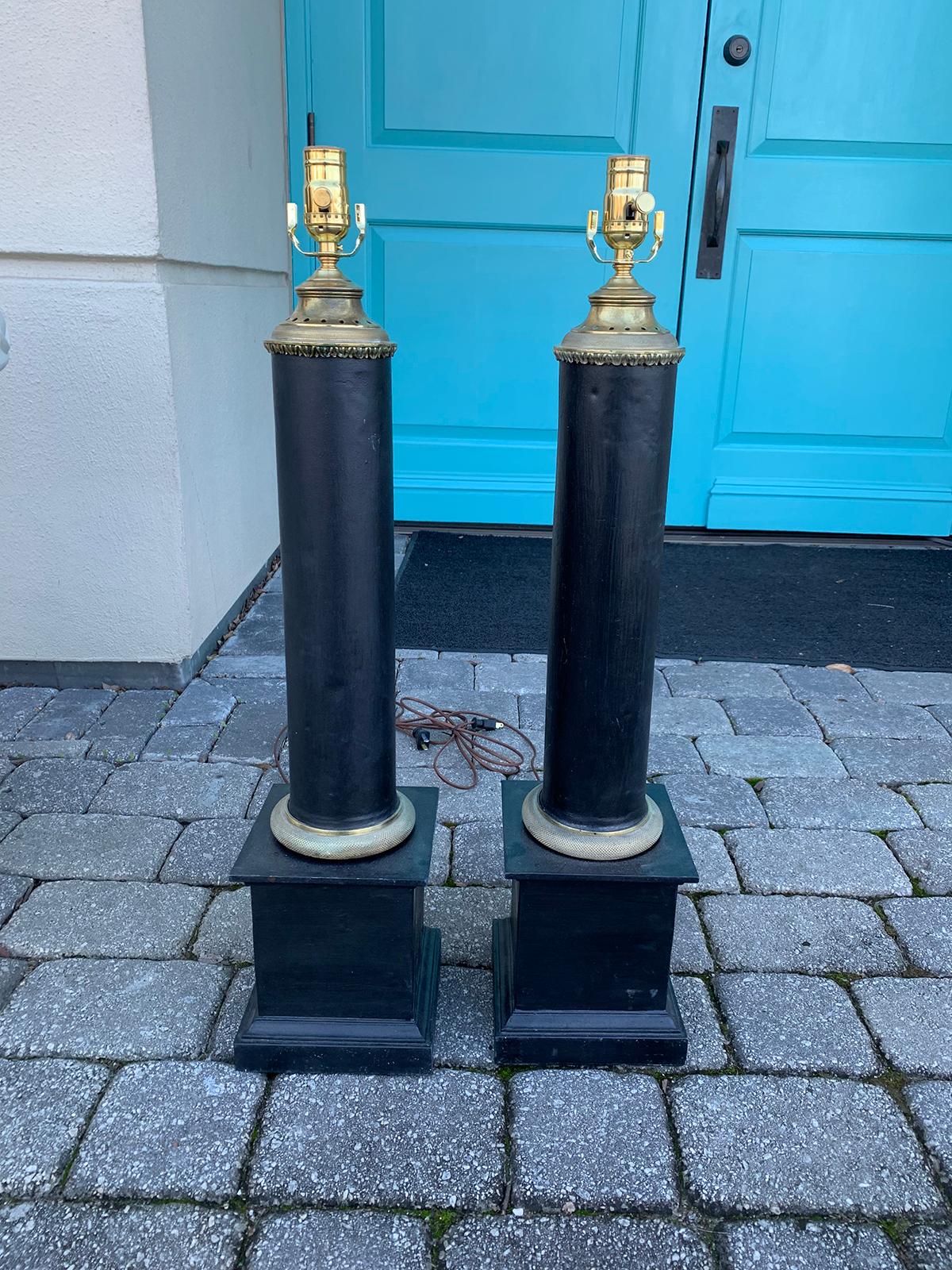 Pair of early 20th century black tole column lamps
Brand new wiring.