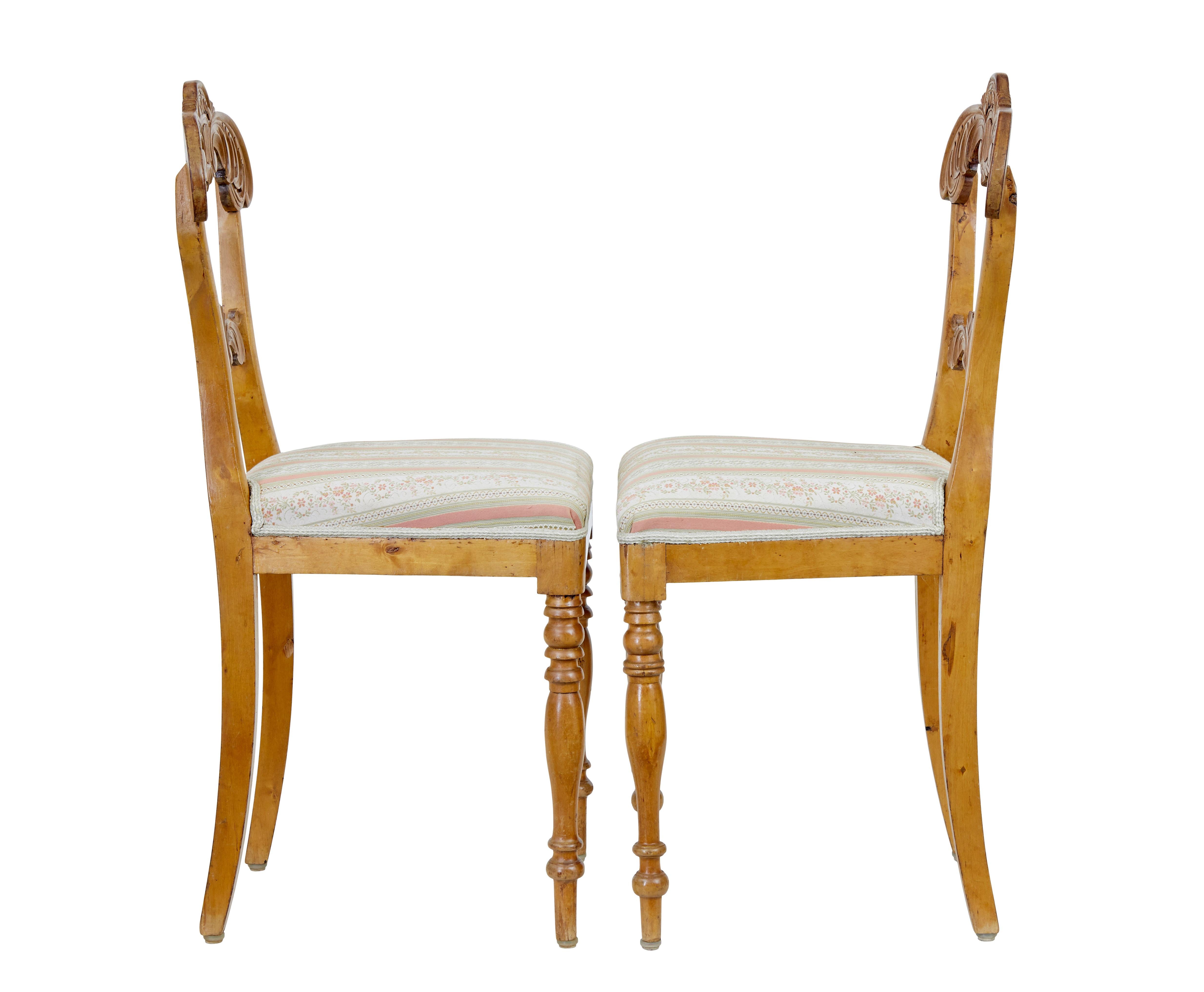 Swedish Pair of early 20th century carved birch hall chairs For Sale