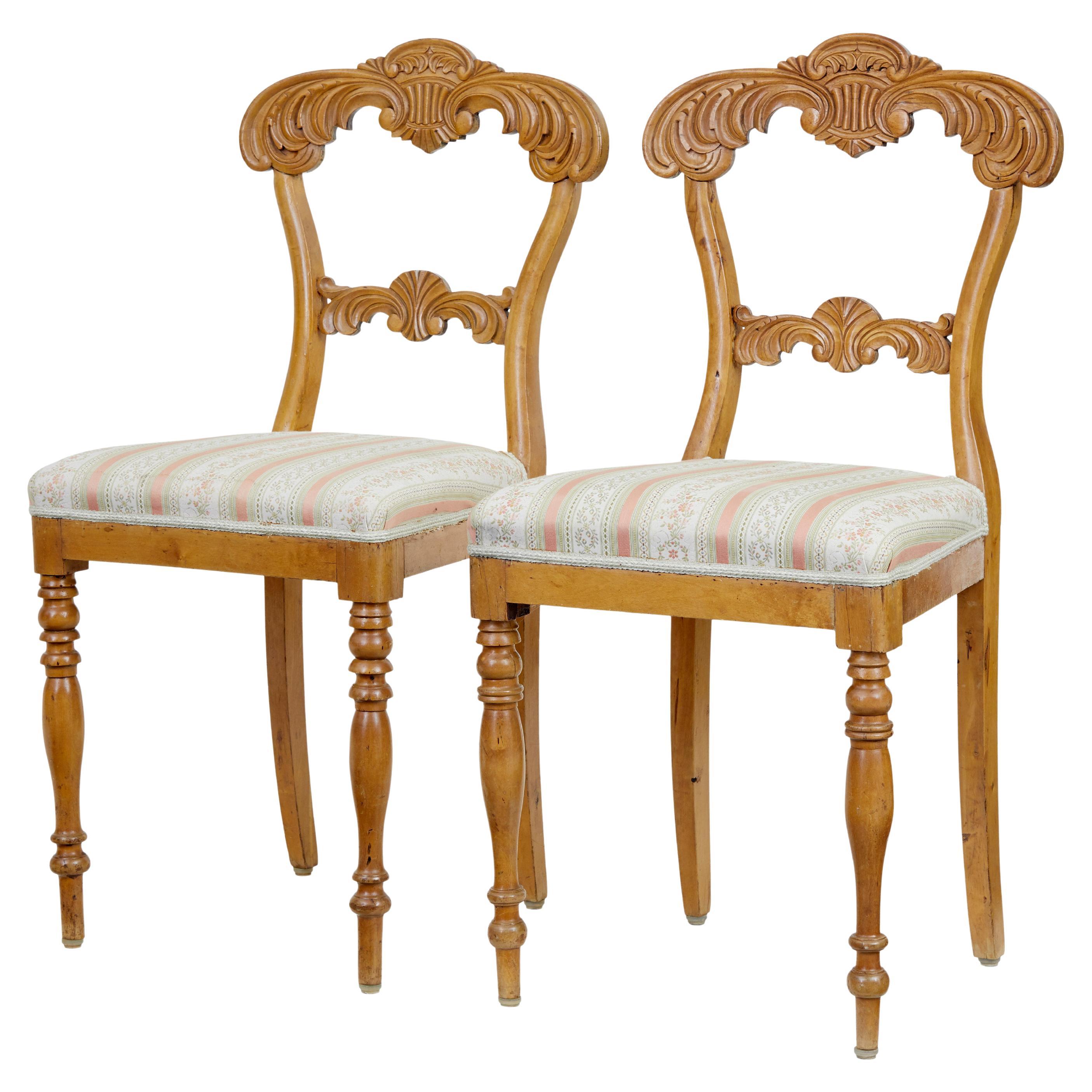 Pair of early 20th century carved birch hall chairs For Sale