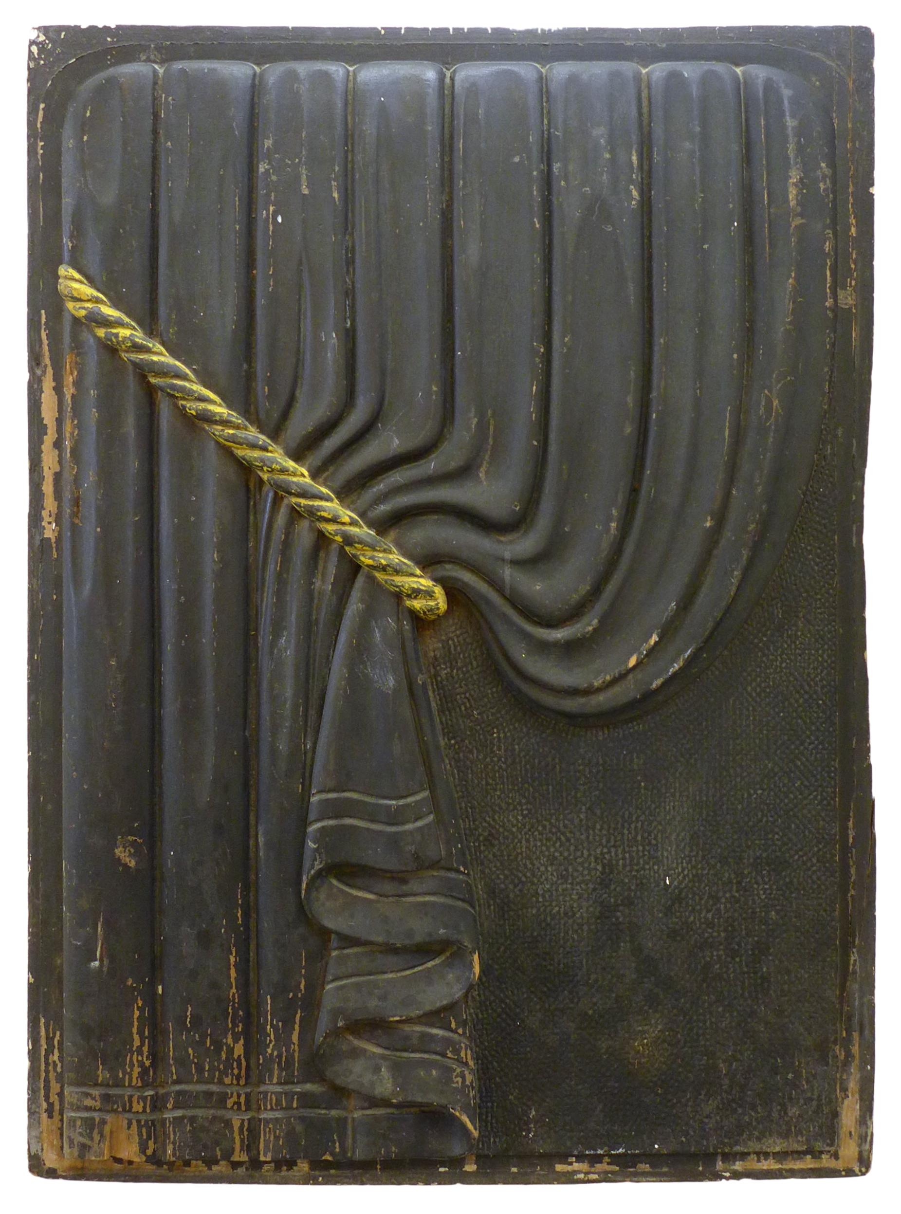 A wonderful pair of early 20th century, carved wood, funeral-coach curtain panels. A mirror-matched pair of matte black, bas-relief curtains with contrasting, gilt rope tiebacks. These sorts of panels were traditionally used as symbolic trompe