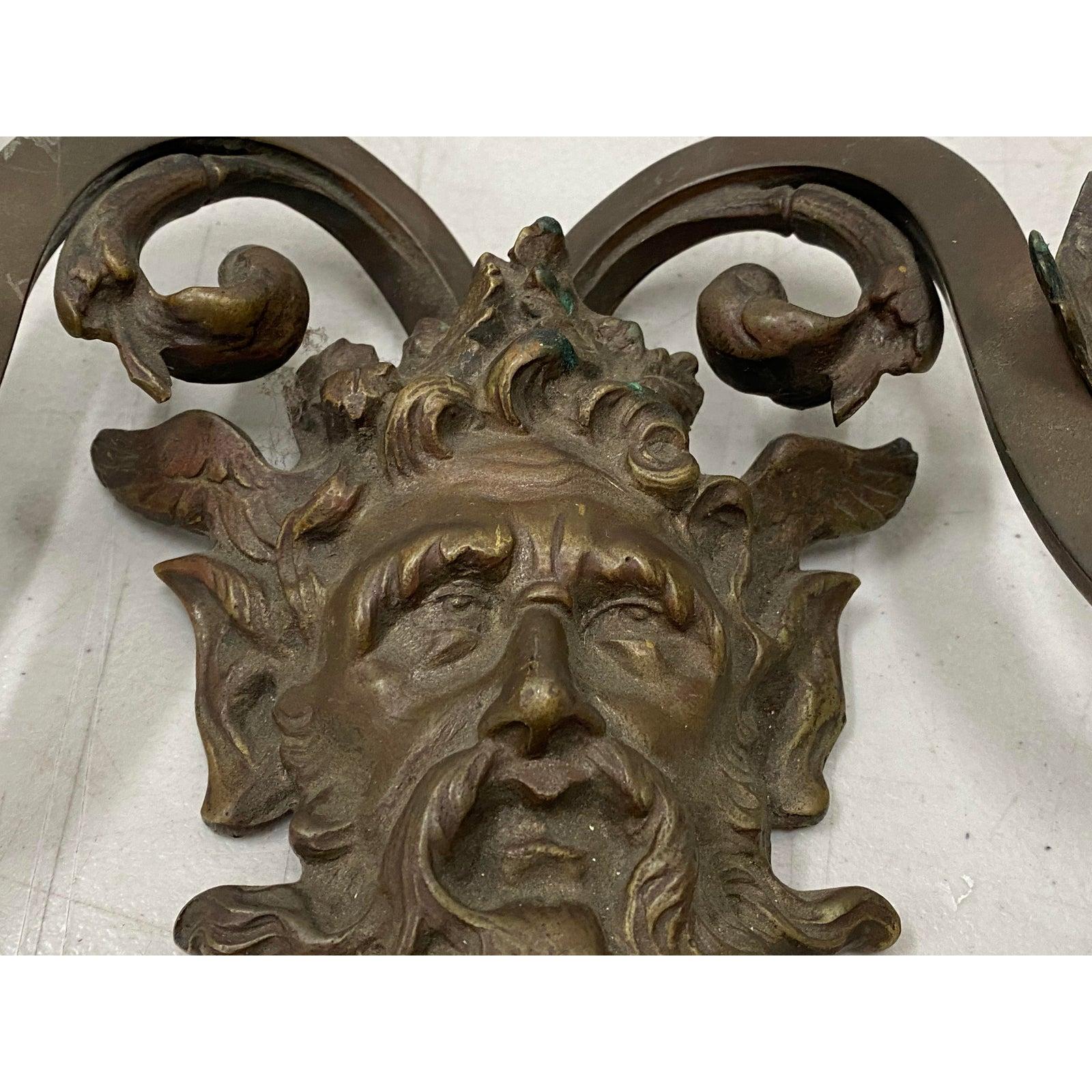Pair of early 20th century cast bronze sconces

Each sconce measures: 16.5