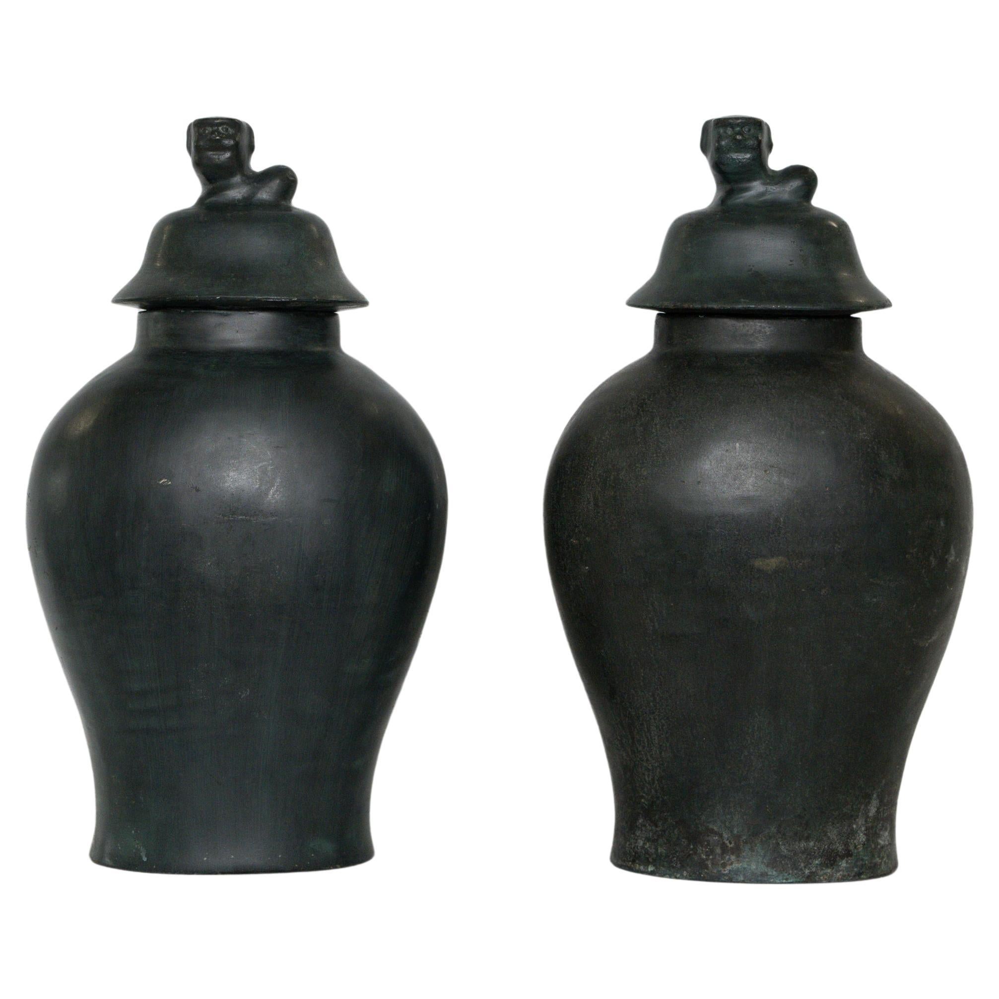 Pair of Early 20th Century Chinese Bronze Urns with Lids For Sale