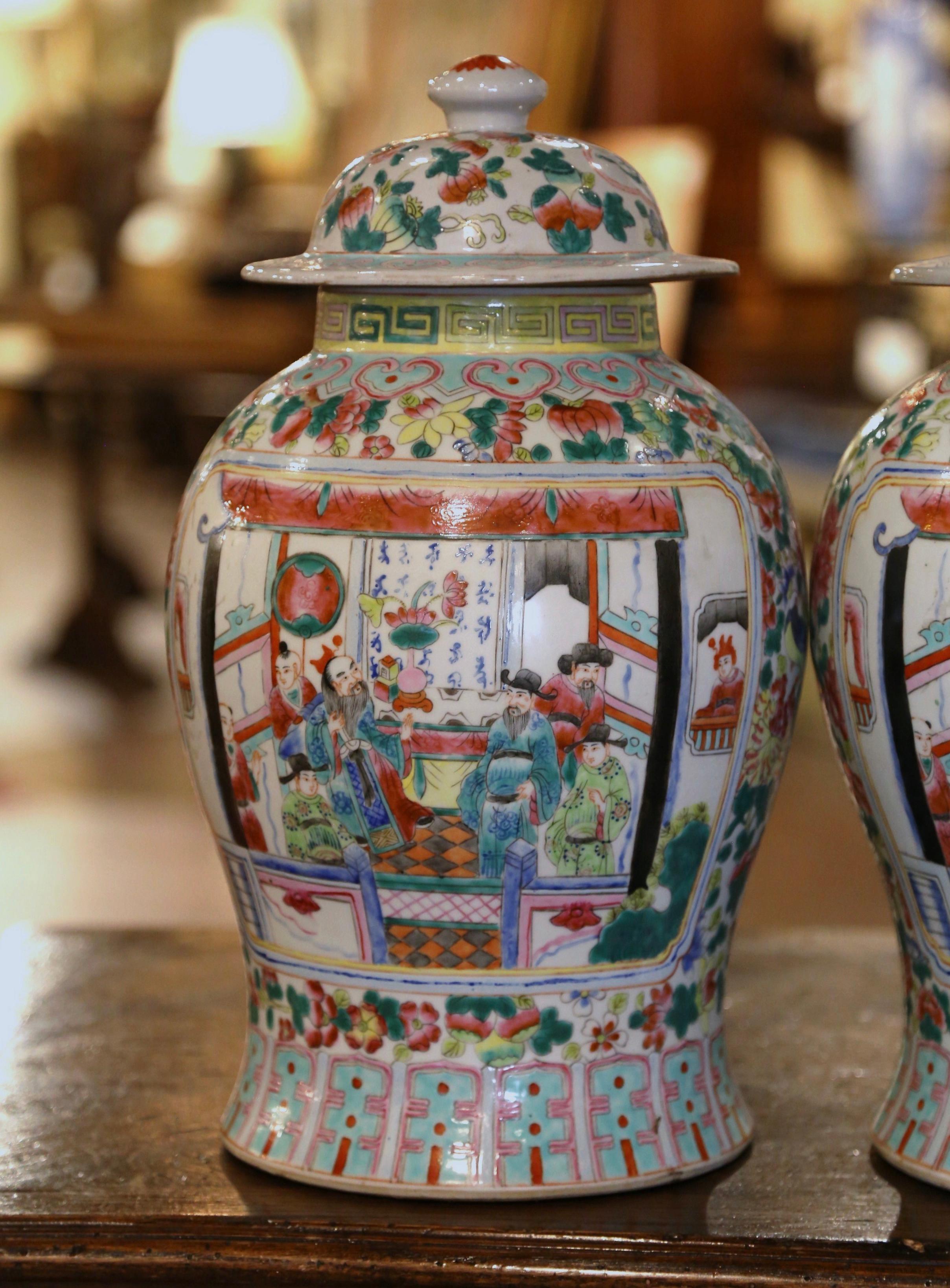 Hand-Crafted Pair of Early 20th Century Chinese Painted Famille Rose Porcelain Lidded Jars