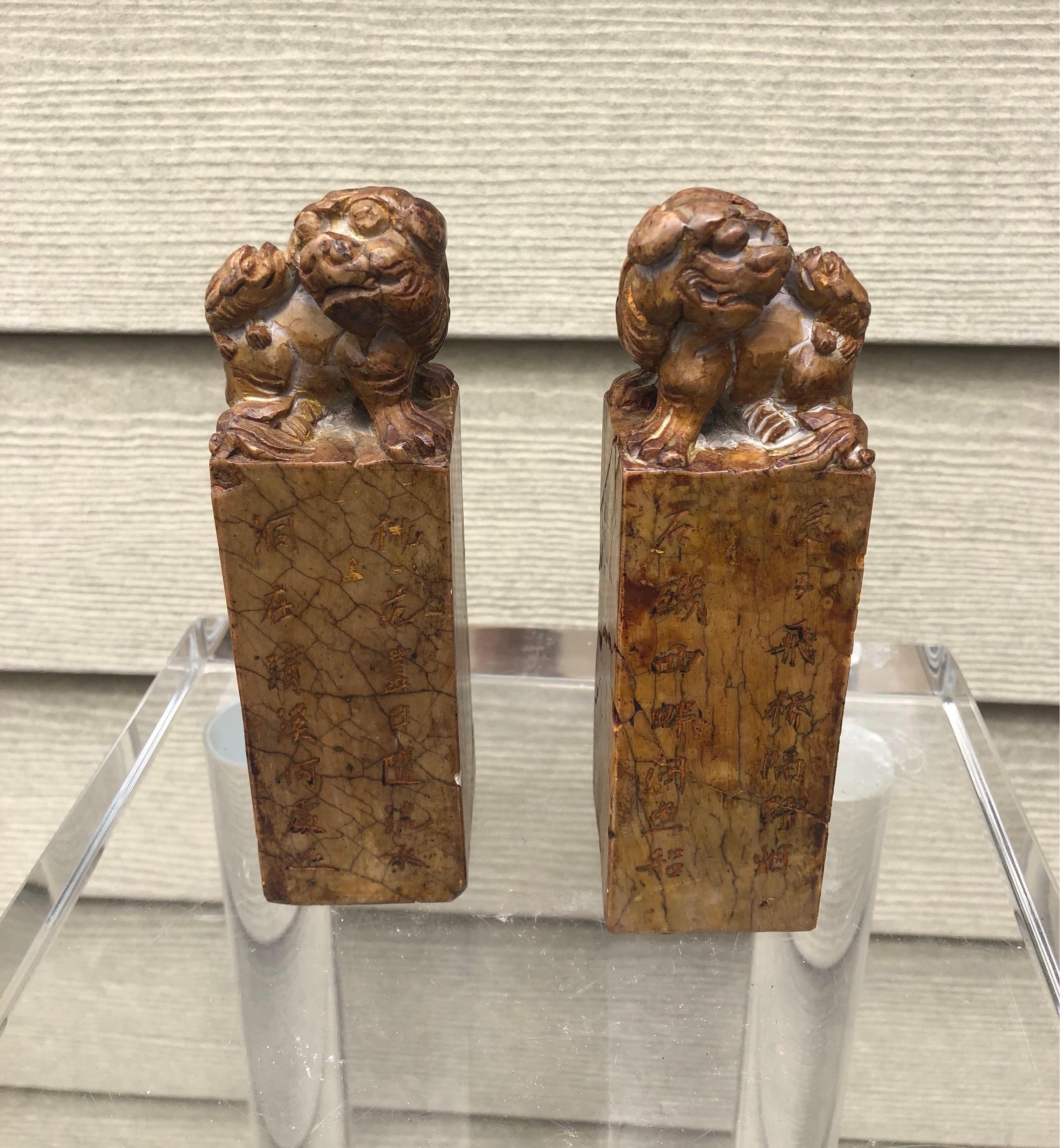 Great pair of Chinese seals from the late 19th-early 20th century with bixies on top and characters on sides and bottom.