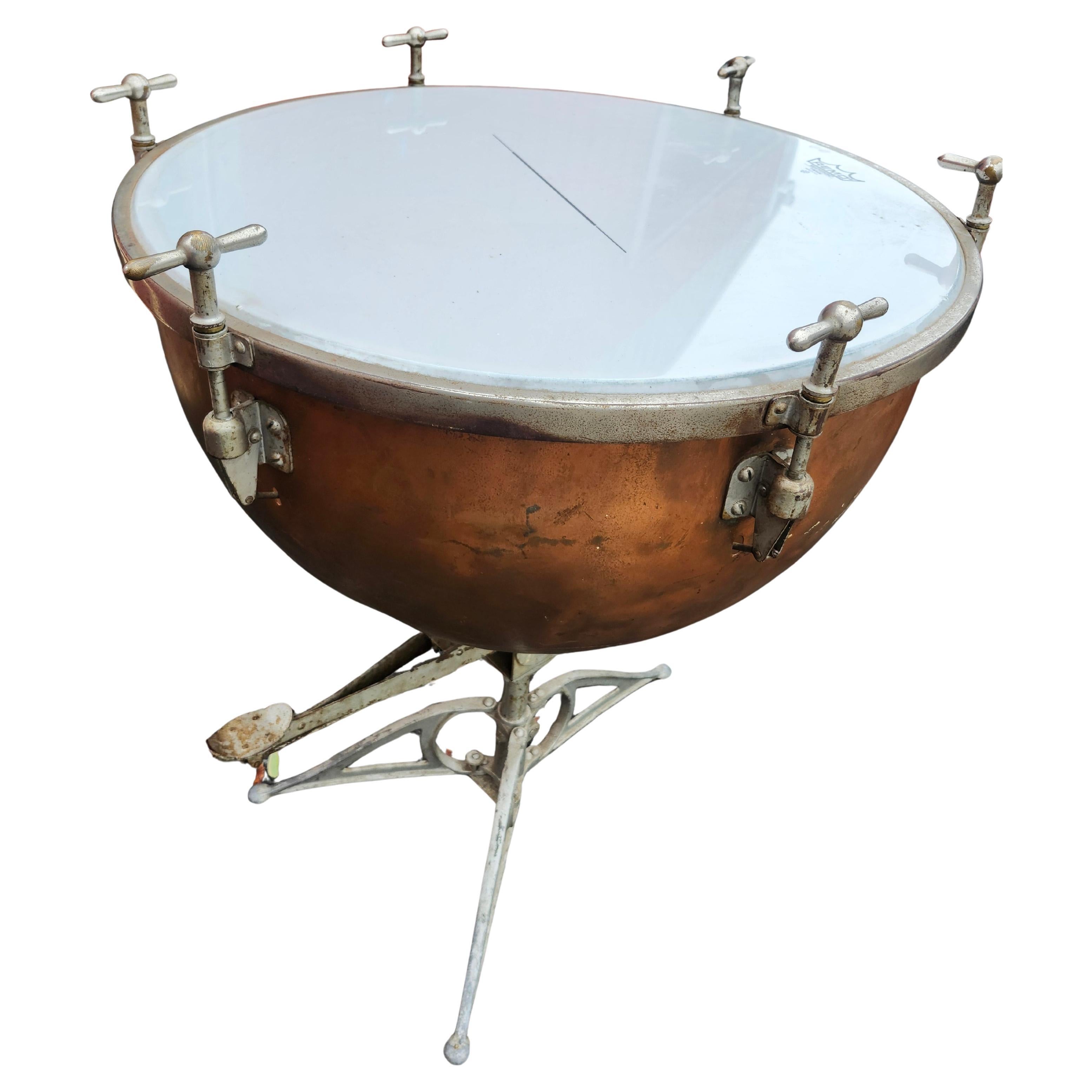 Spectacular pair of large and very solidly built Leedy Copper Kettle Drum Timpanis C1920. Simply beautiful instruments even if just for decoration. Can be used as side or center tables.
One is 29.5 wide the other is 26.5 with all original parts with