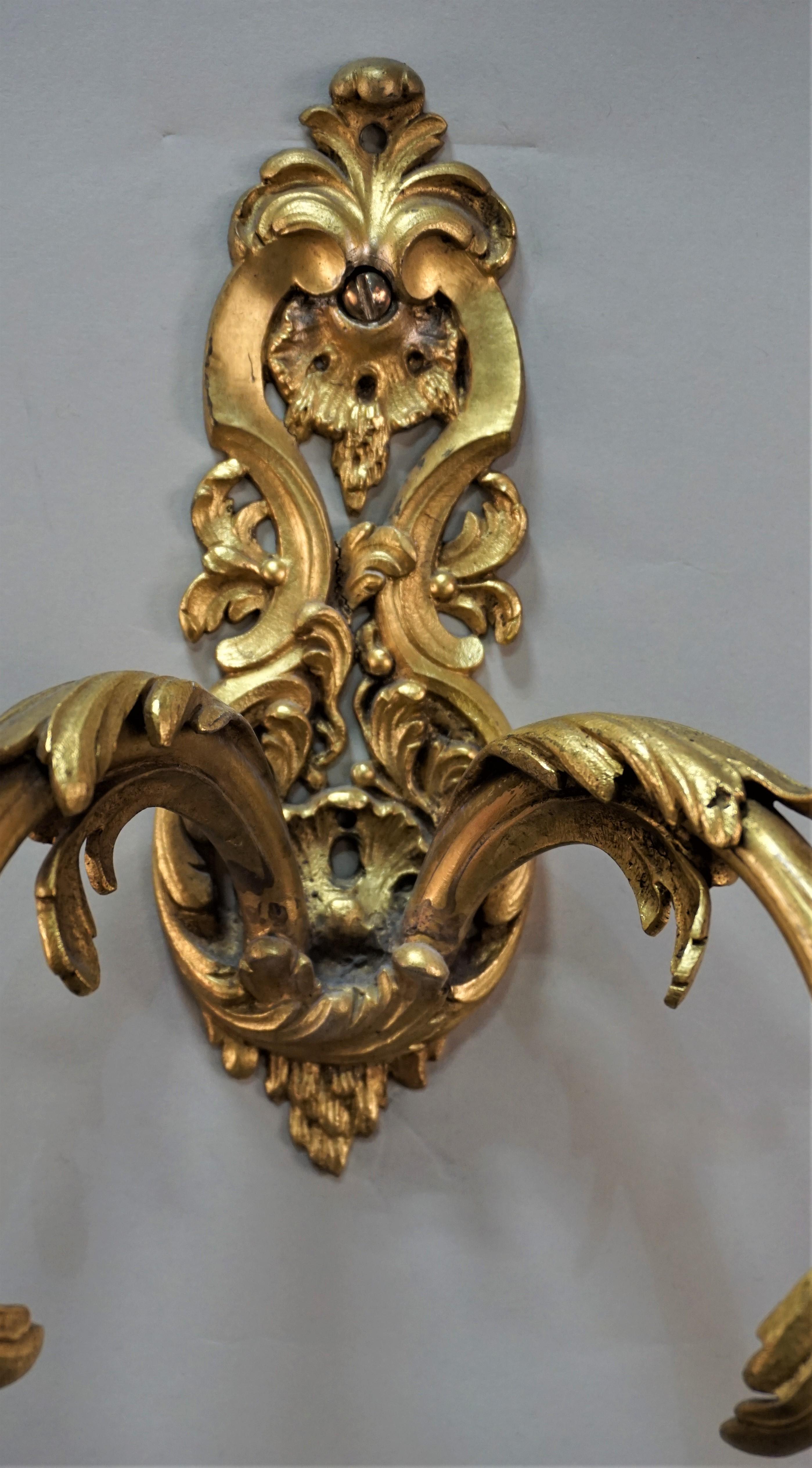French early 20th century bronze doré pair of wall sconces.
