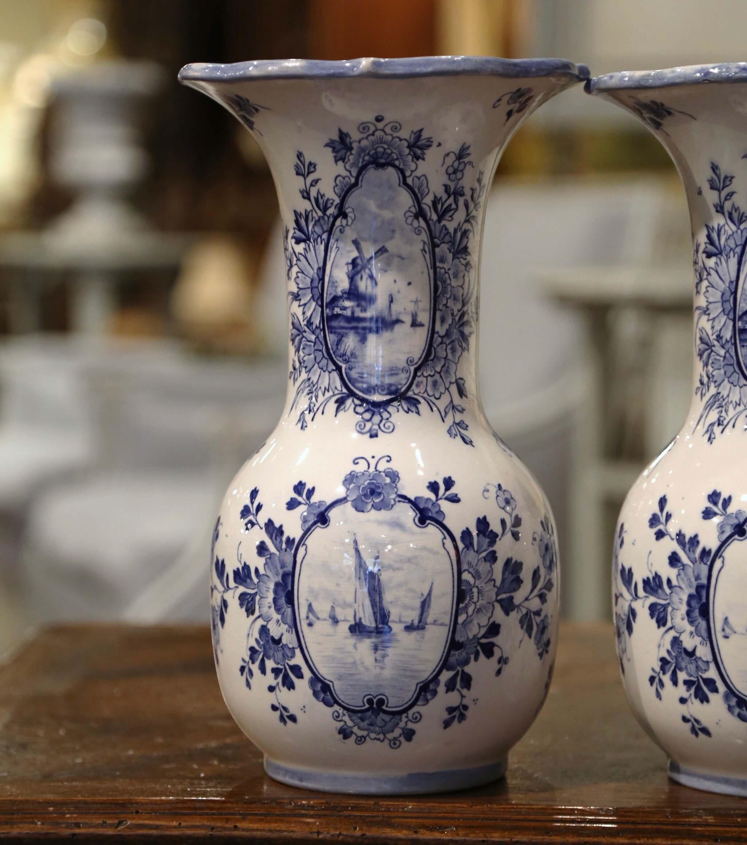 Ceramic Pair of Early 20th Century Dutch Blue and White Hand Painted Faience Delft Vases For Sale
