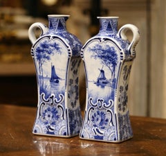 Pair of Early 20th Century Dutch Painted Faience Delft Oil or Vinegar Bottles