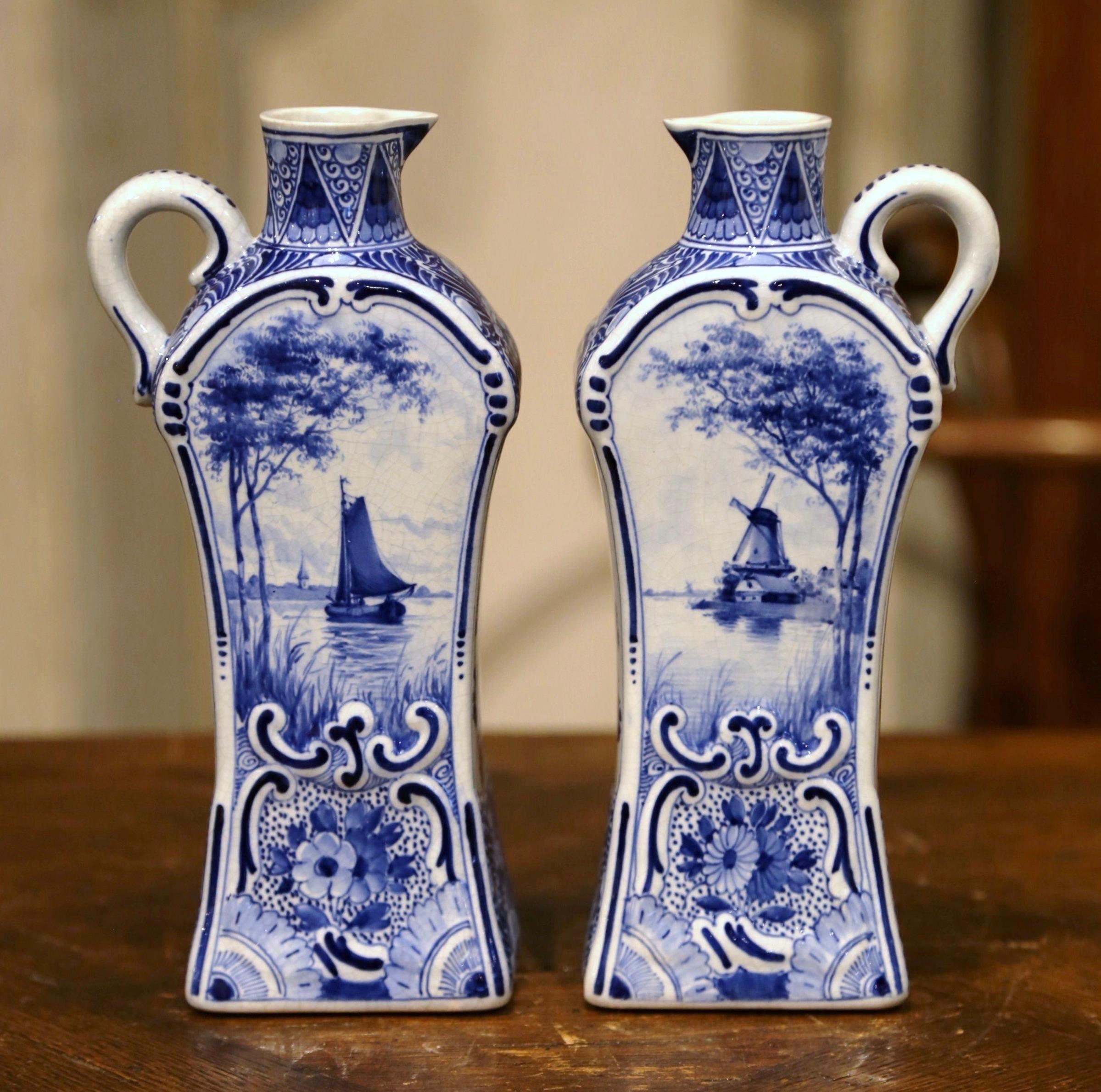 Ceramic Pair of Early 20th Century Dutch Painted Faience Delft Oil or Vinegar Bottles For Sale