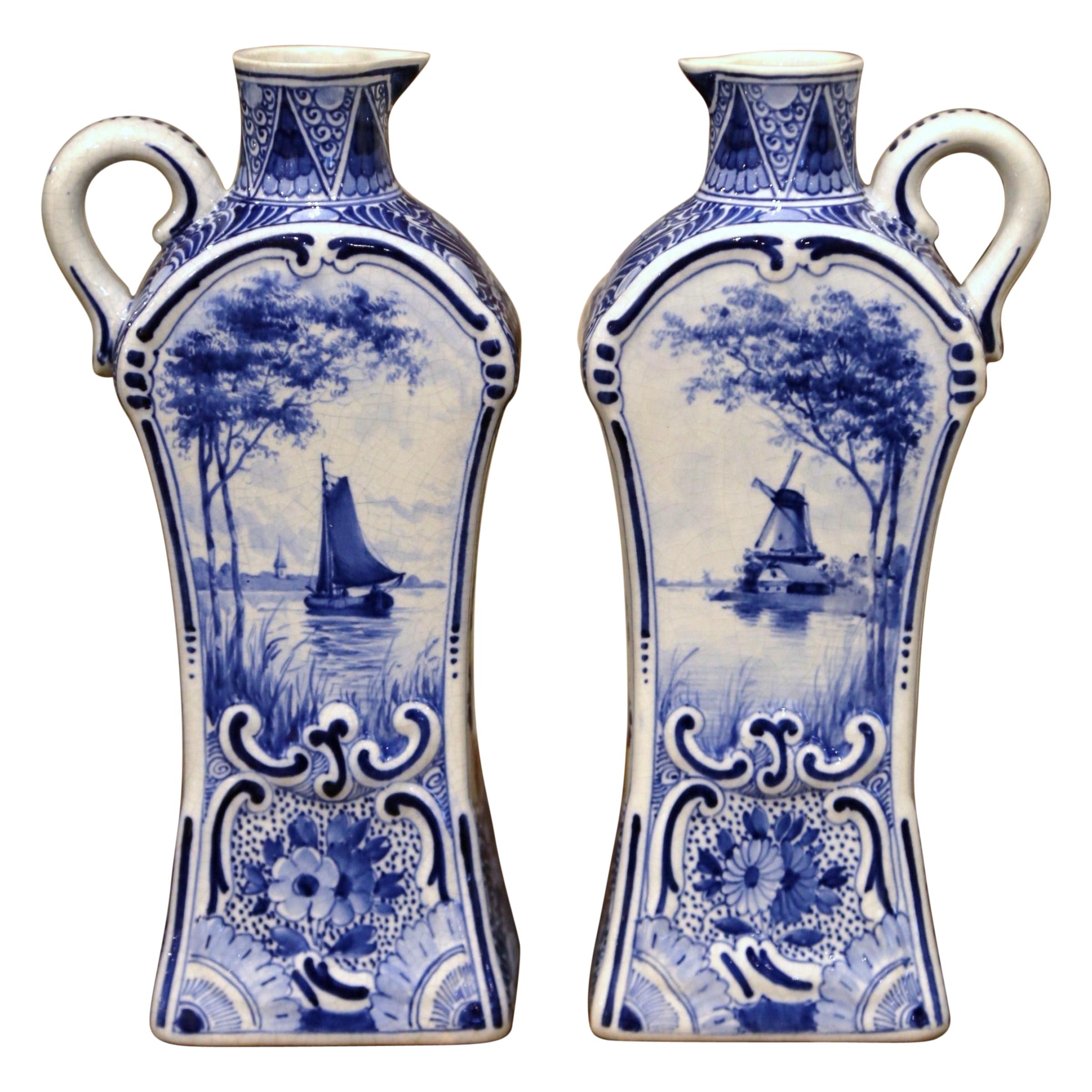 Pair of Early 20th Century Dutch Painted Faience Delft Oil or Vinegar Bottles For Sale