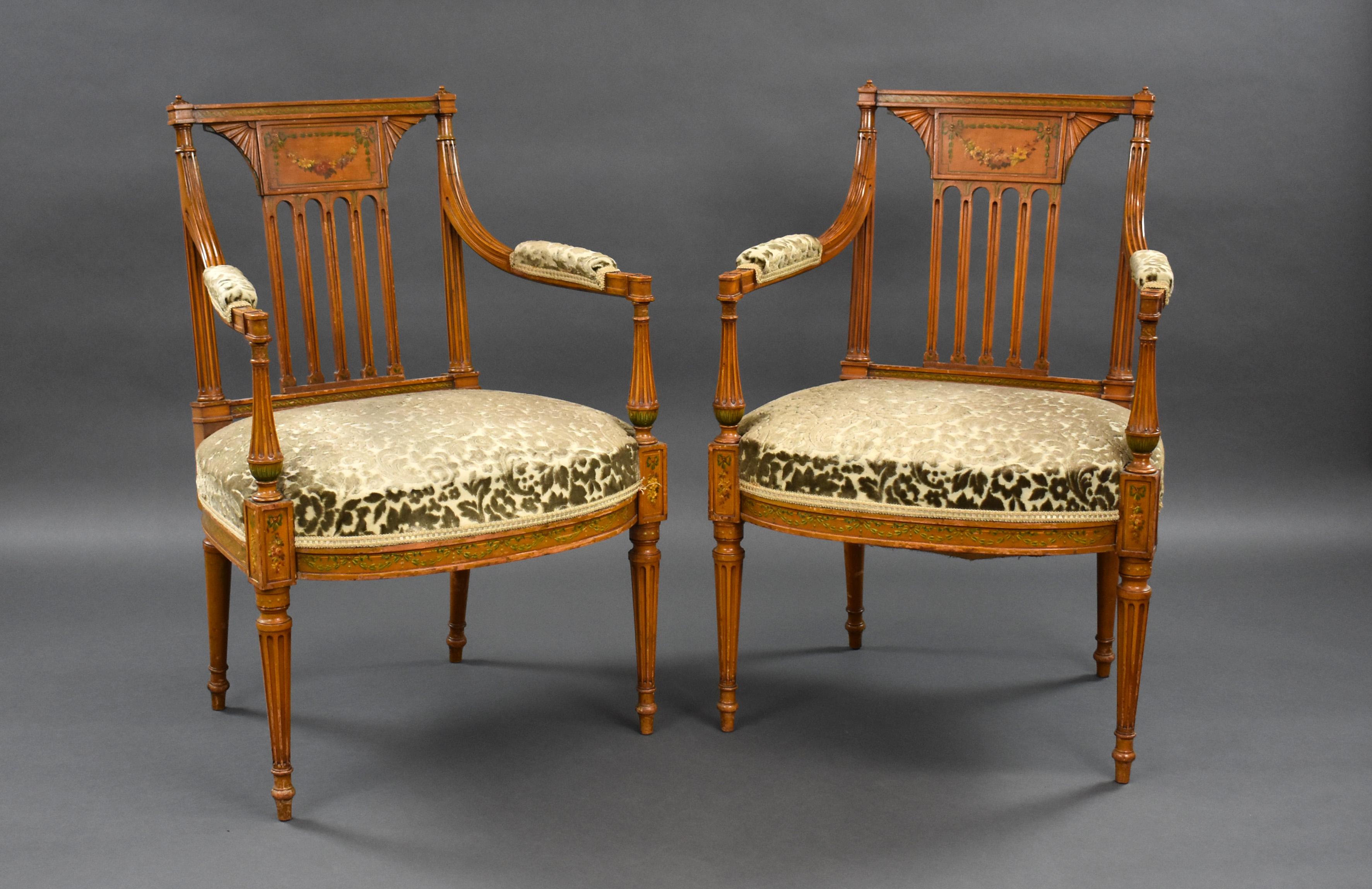 For sale is a good quality Pair of Edwardian Satinwood hand painted armchairs. Each chair has a tablet back and stuff over seat standing on fluted legs both chairs are in very good condition for their age. 

Width: 60cm Depth: 46cm Height: 88cm
