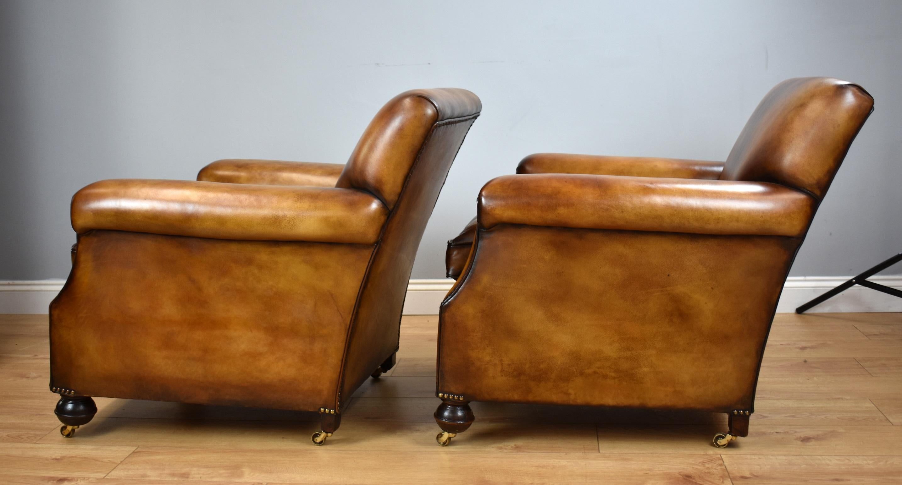 Brass Pair of Early 20th Century English Hand Dyed Leather Club Chairs