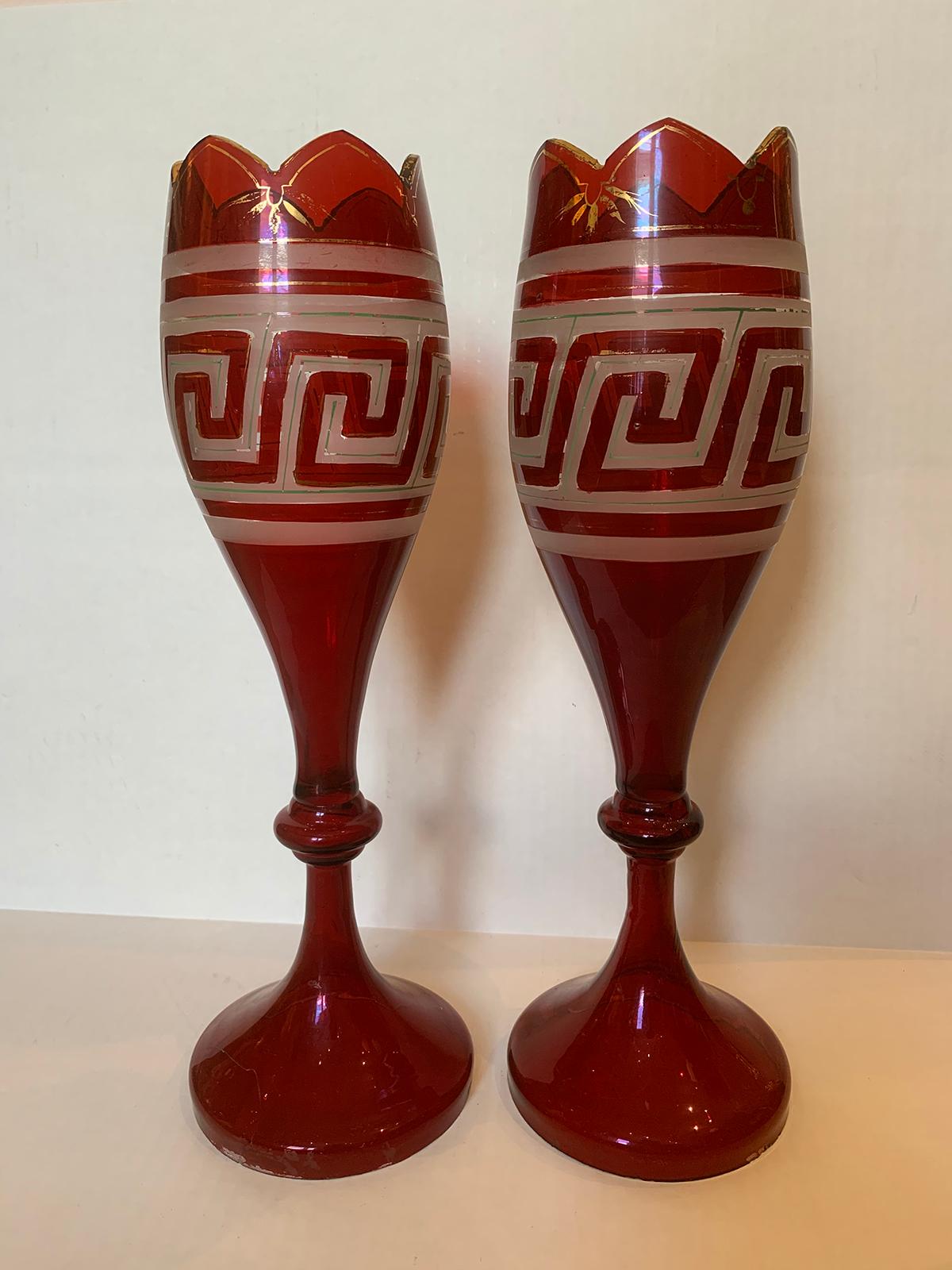 Pair of early 20th century etched Greek Key red glass vases with gilt detail.