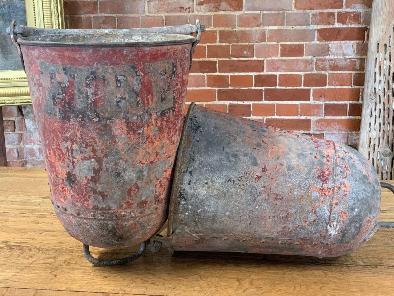 A nice pair of early 20th century metal fire buckets with original worn paint.
Please contact us for an accurate shipping quote.