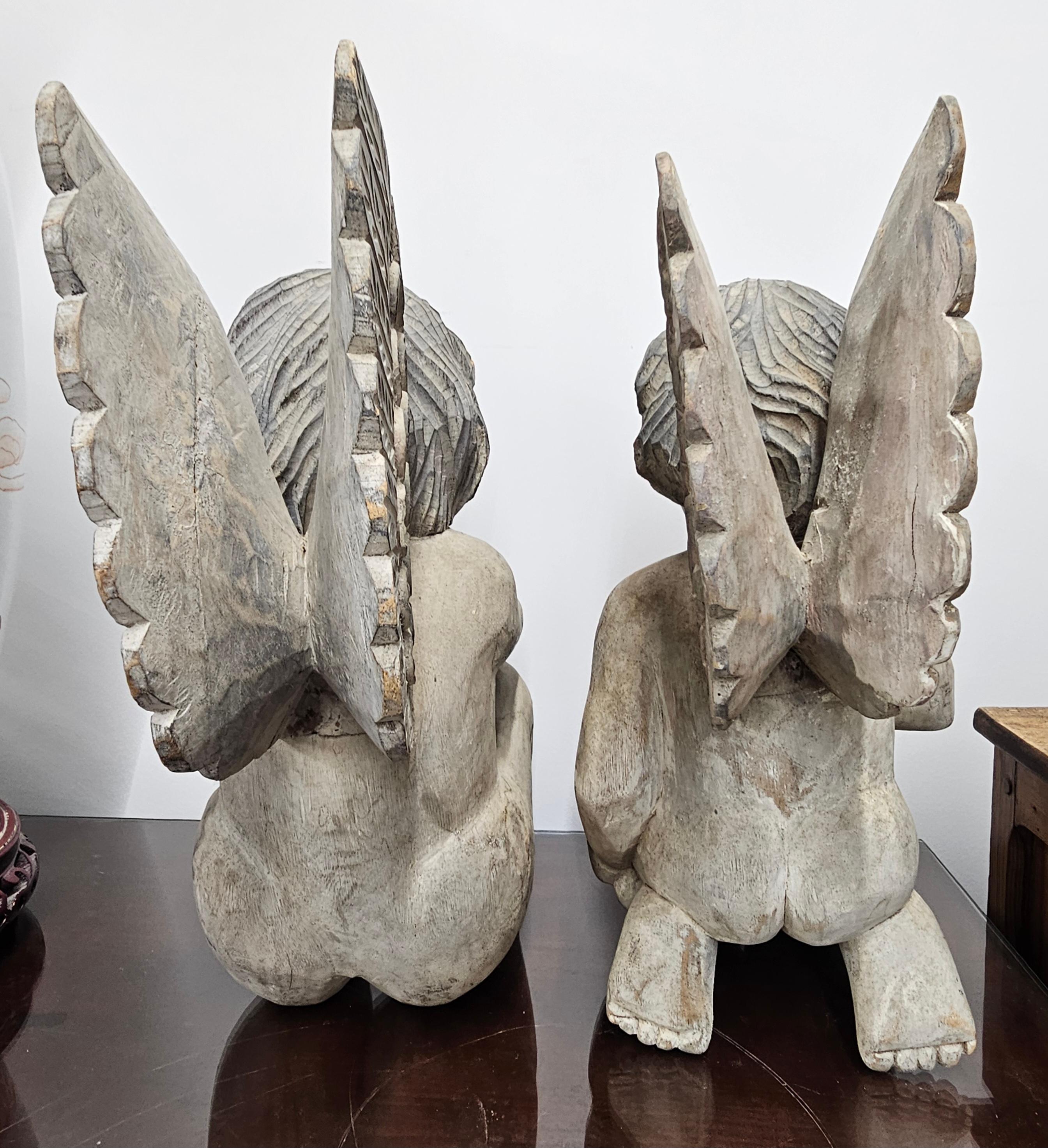 Hardwood Pair of Early 20th Century Free Standing Carved Wood Cherubs, Putti  Angels For Sale