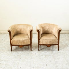Par de sillones bergère de caoba de la época Art Déco francesa, de principios del siglo XX