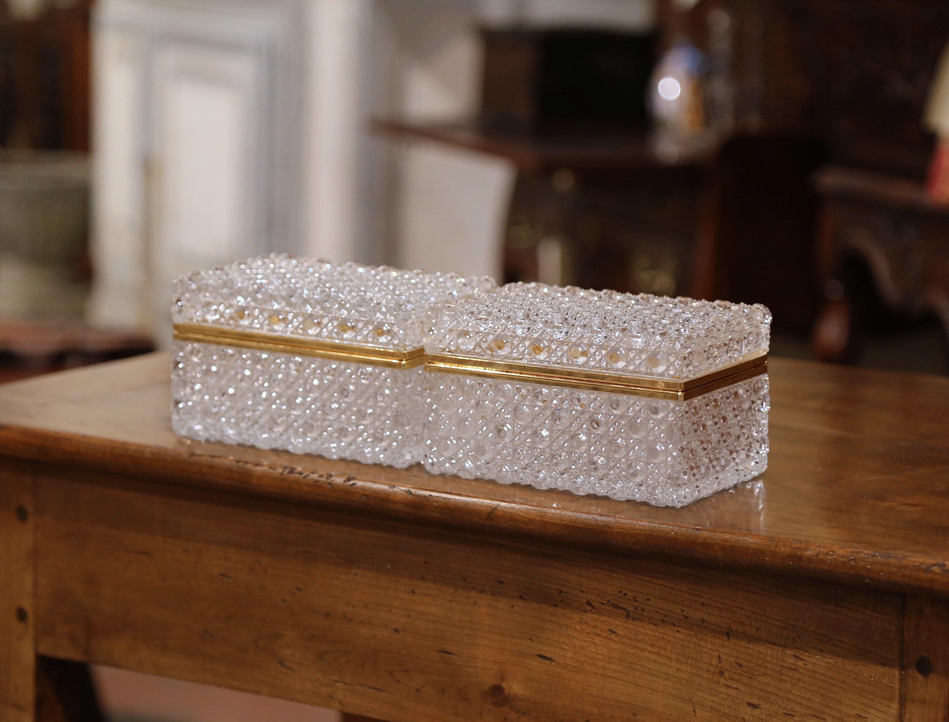 Keep your jewelry or other valuables in these delicate baccarat style antique boxes; crafted in France circa 1920, each decorative cut glass box features decorative brass rim for structural purpose and embellishment Use these rectangular boxes in