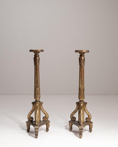 Paire de sellettes en bois sculpté et doré du début du 20e siècle