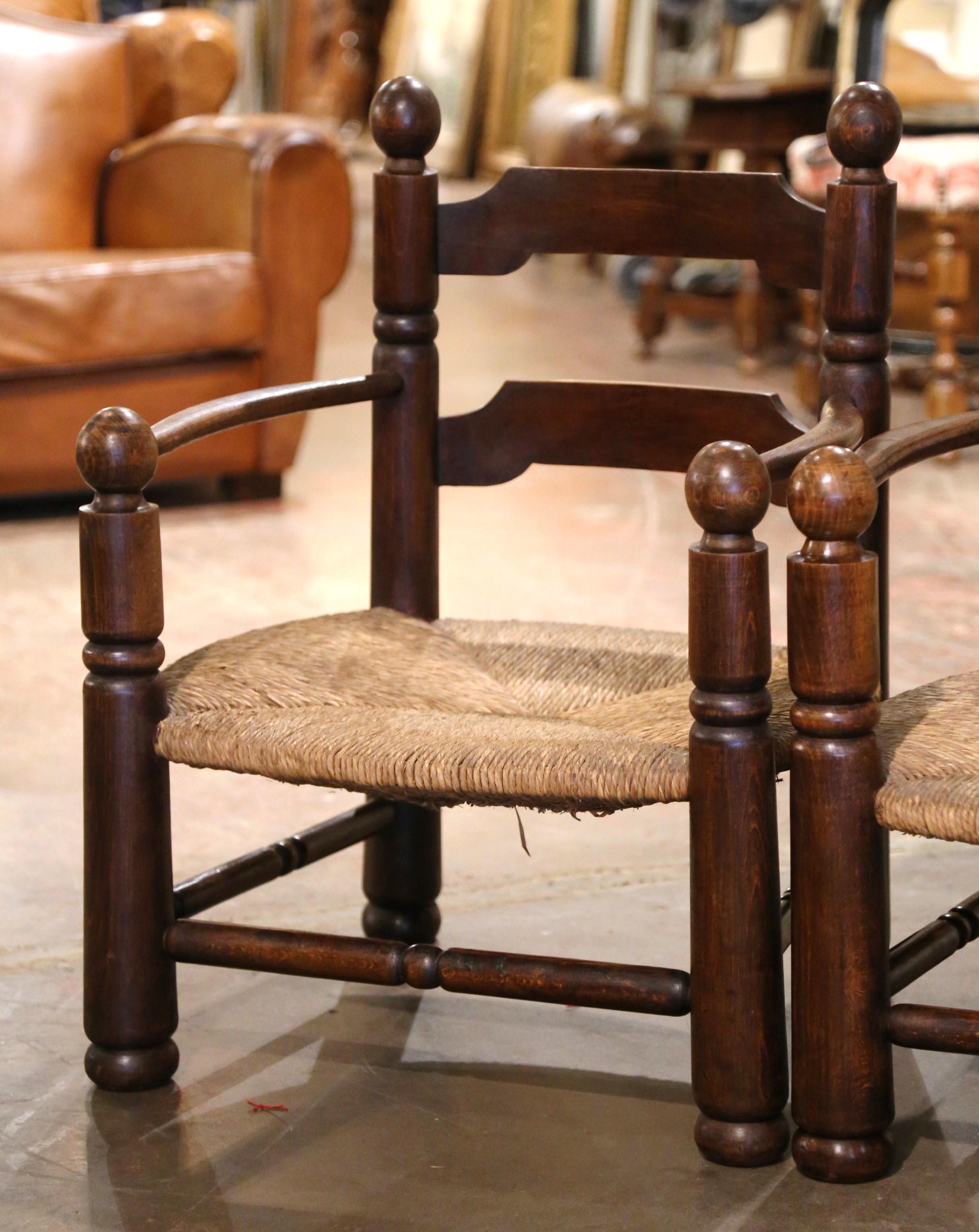 Country Pair of Early 20th Century French Carved Oak, Rush Seat Fireplace Low Armchairs