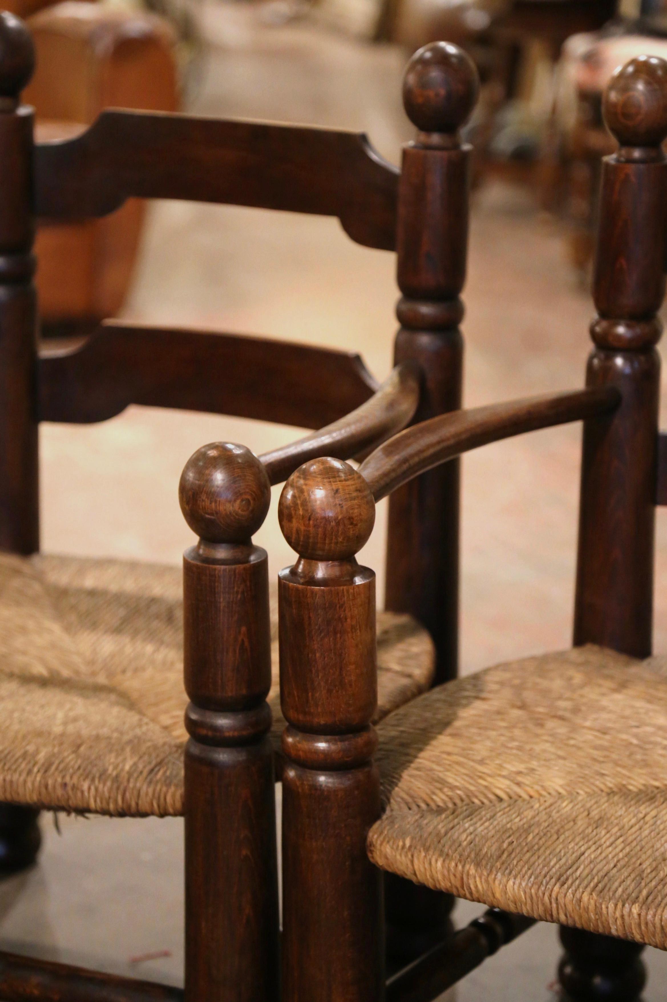 Hand-Carved Pair of Early 20th Century French Carved Oak, Rush Seat Fireplace Low Armchairs