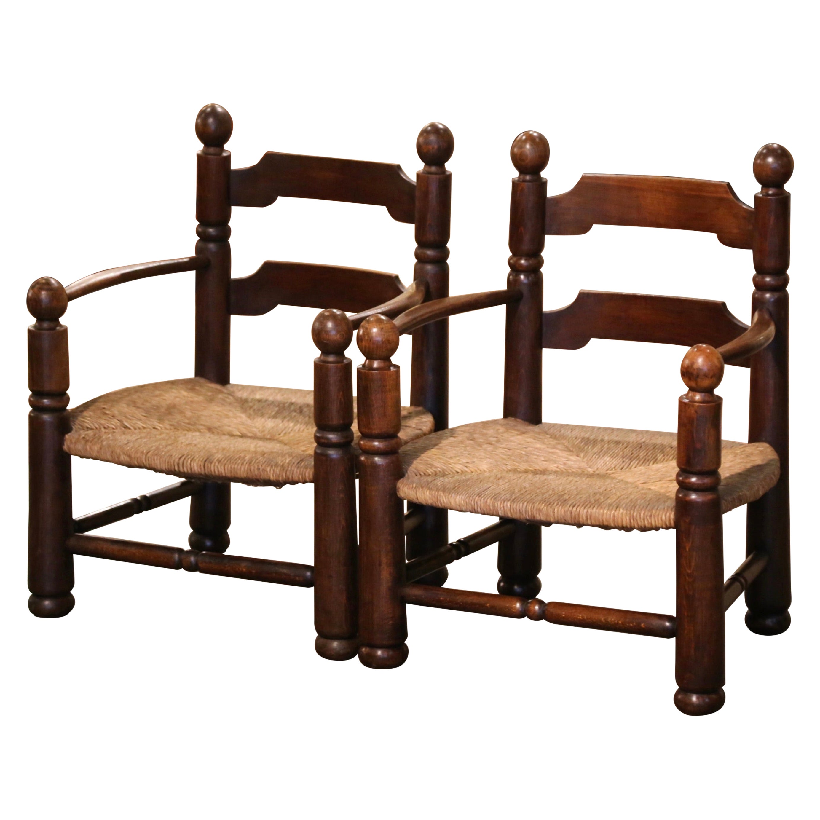 Pair of Early 20th Century French Carved Oak, Rush Seat Fireplace Low Armchairs