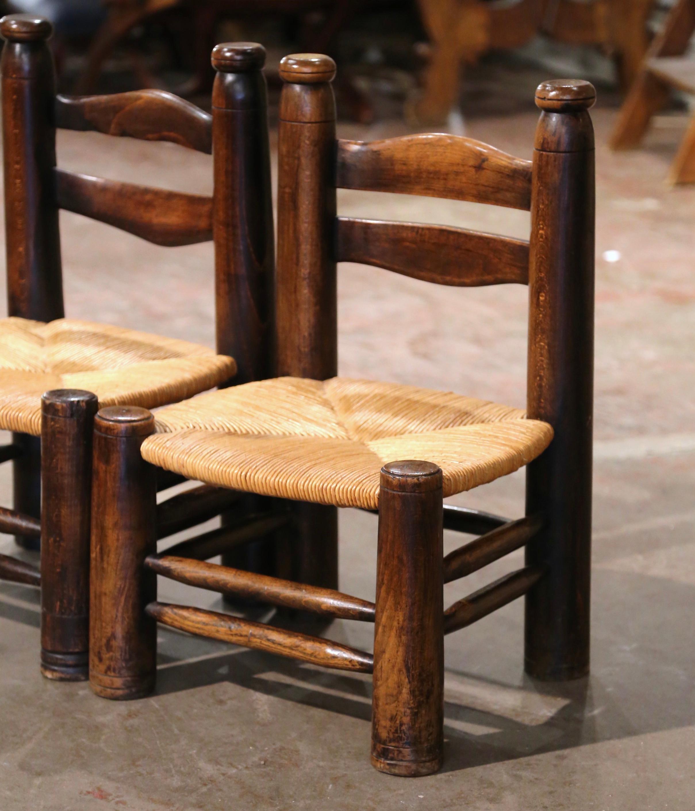 Hand-Carved Pair of Early 20th Century French Carved Walnut and Rush Seat Low Chairs For Sale