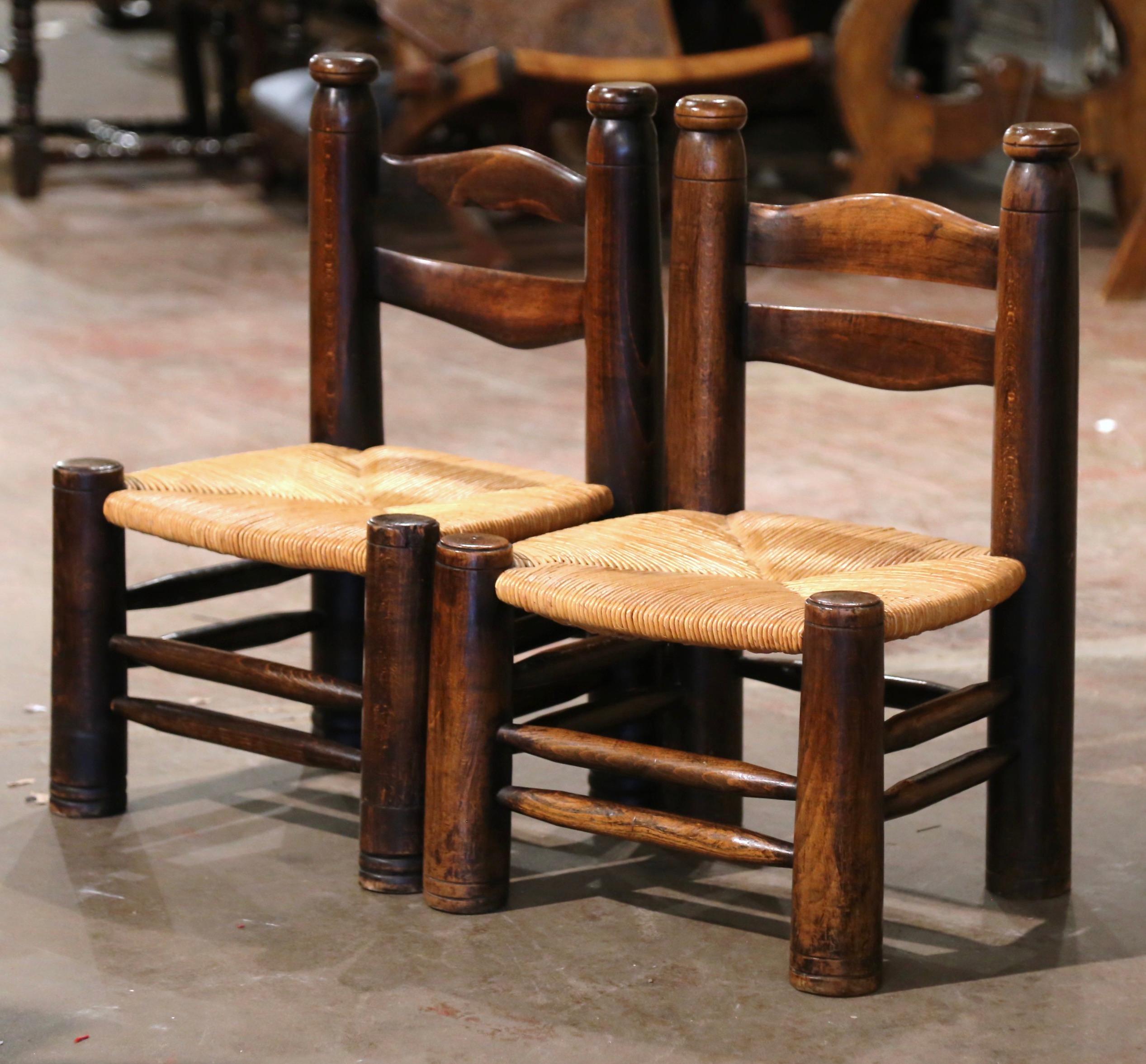 Pair of Early 20th Century French Carved Walnut and Rush Seat Low Chairs In Excellent Condition For Sale In Dallas, TX