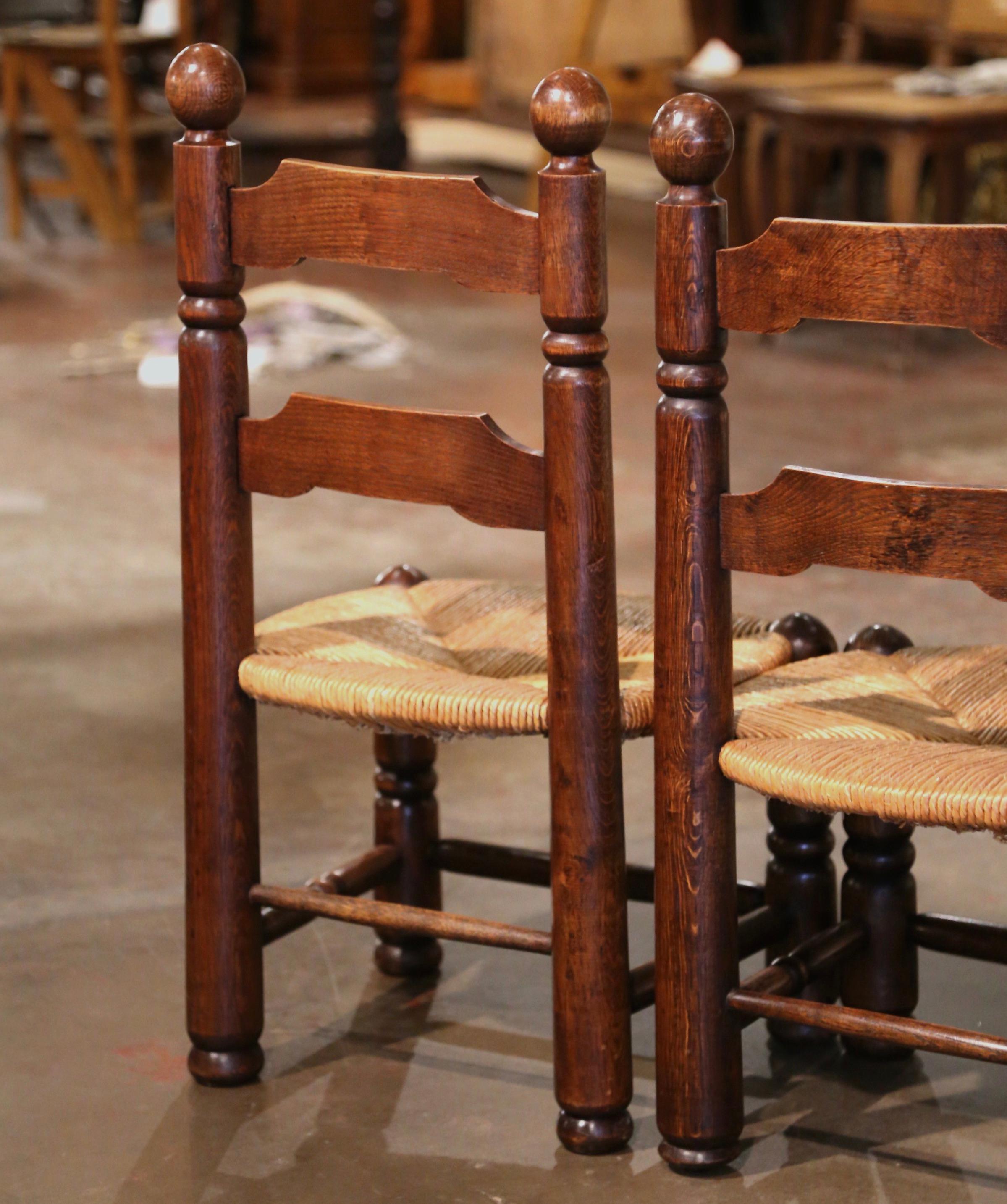 Pair of Early 20th Century French Carved Walnut and Rush Seat Low Chairs 1