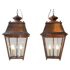 Coppia di lanterne a sospensione in rame francesi dei primi del Novecento