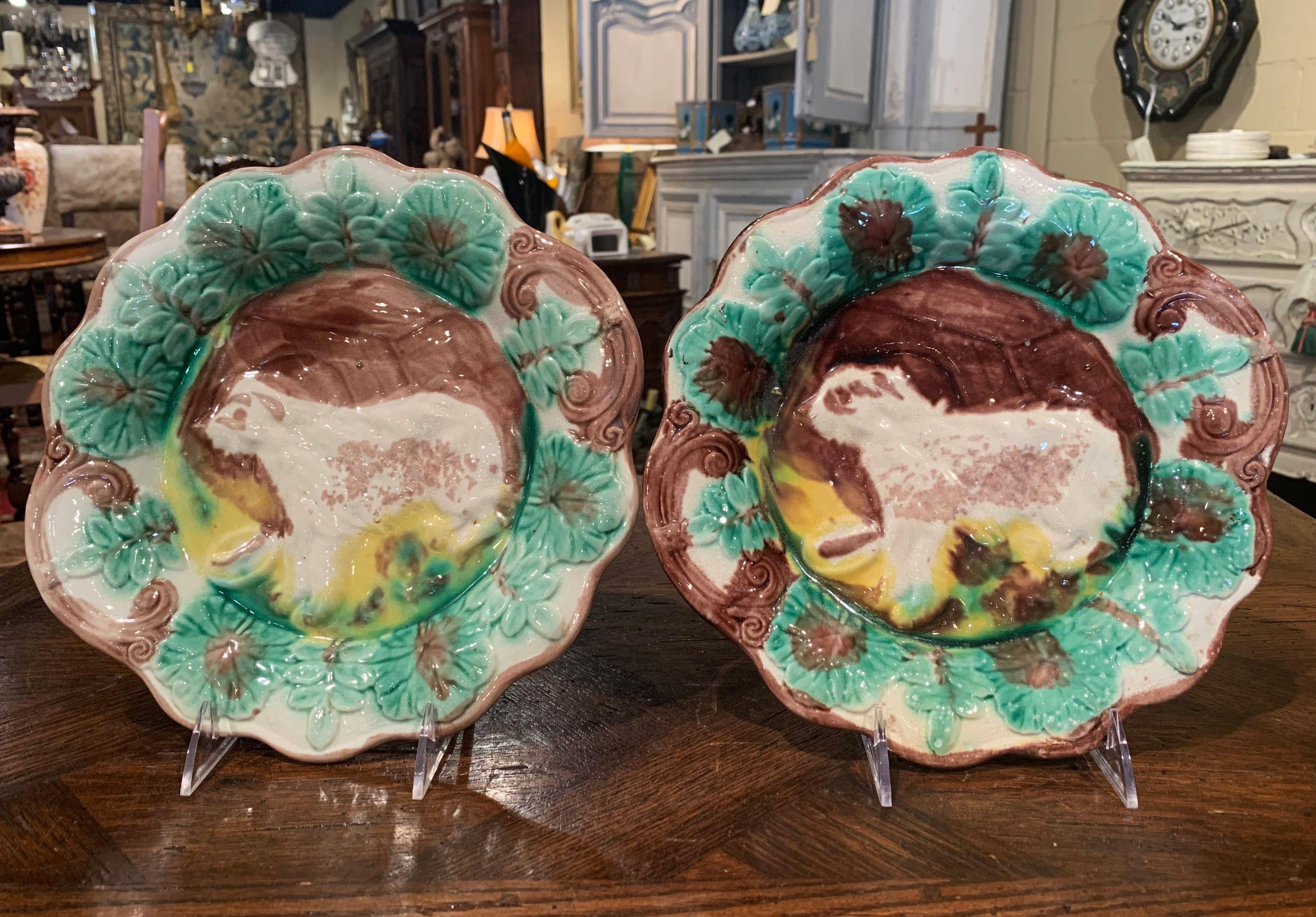 Pair of Early 20th Century French Faience Barbotine Wall Plates with Dog Figures 1