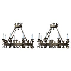 Pair of Early 20th Century French Forged Iron Eight-Light Round Chandeliers