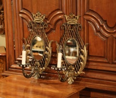 Pair of Early 20th Century French Iron Crystal and Mirrored Wall Sconces