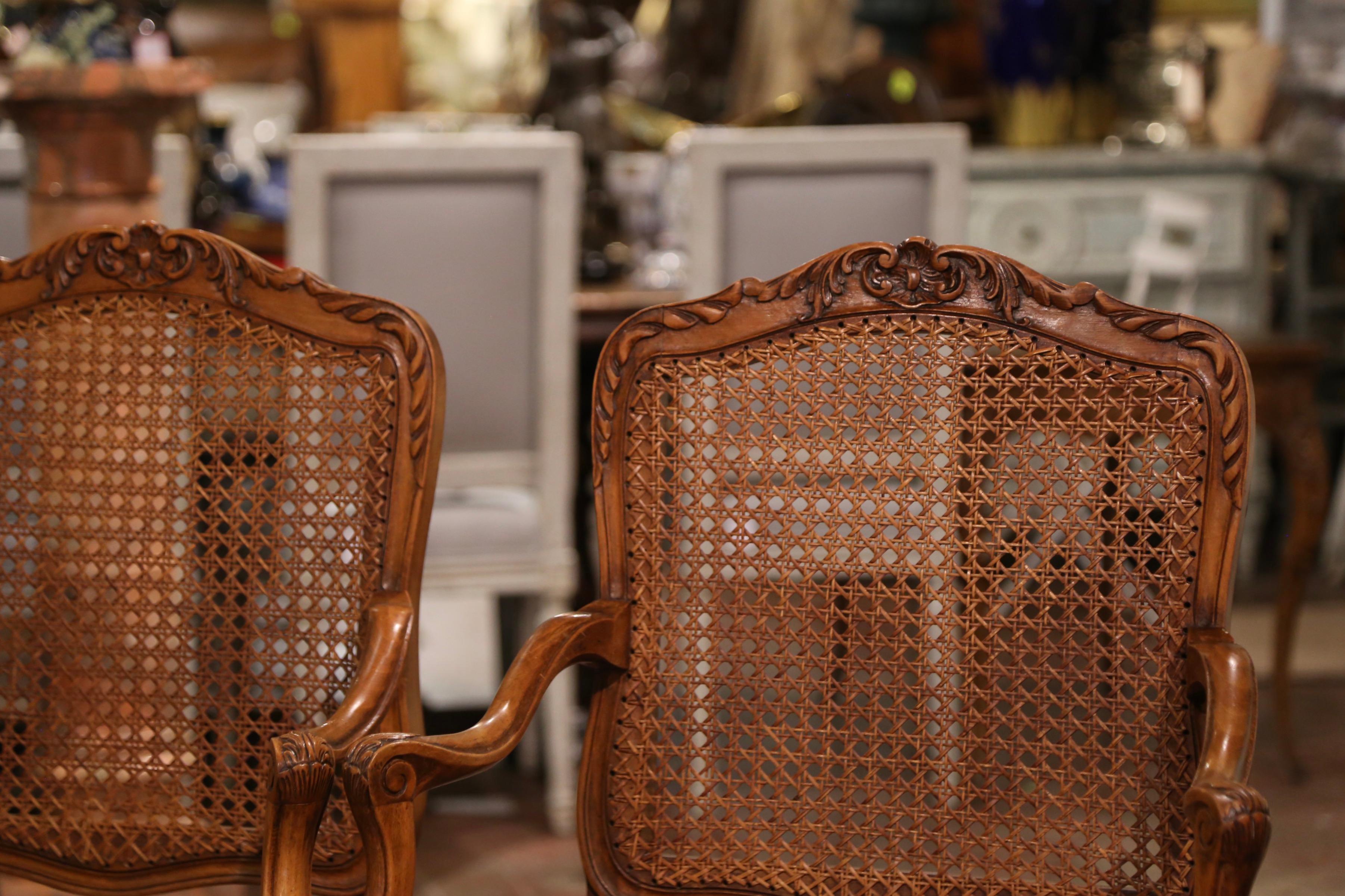 Pair of Early 20th Century French Louis XV Carved Walnut and Cane Armchairs In Excellent Condition In Dallas, TX