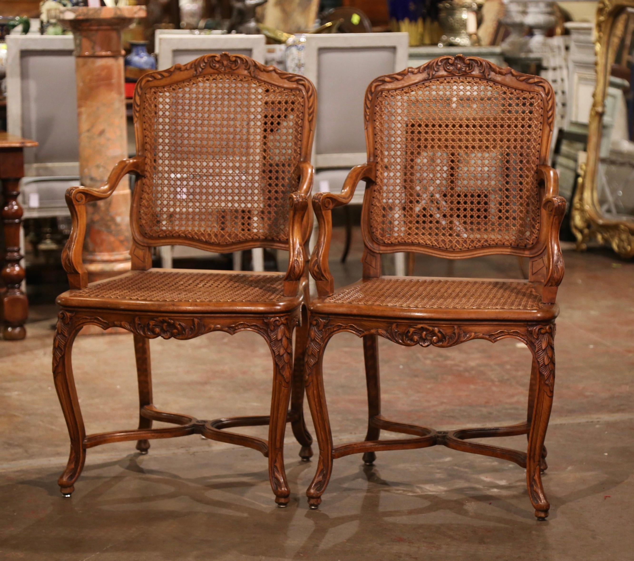 Pair of Early 20th Century French Louis XV Carved Walnut and Cane Armchairs 1