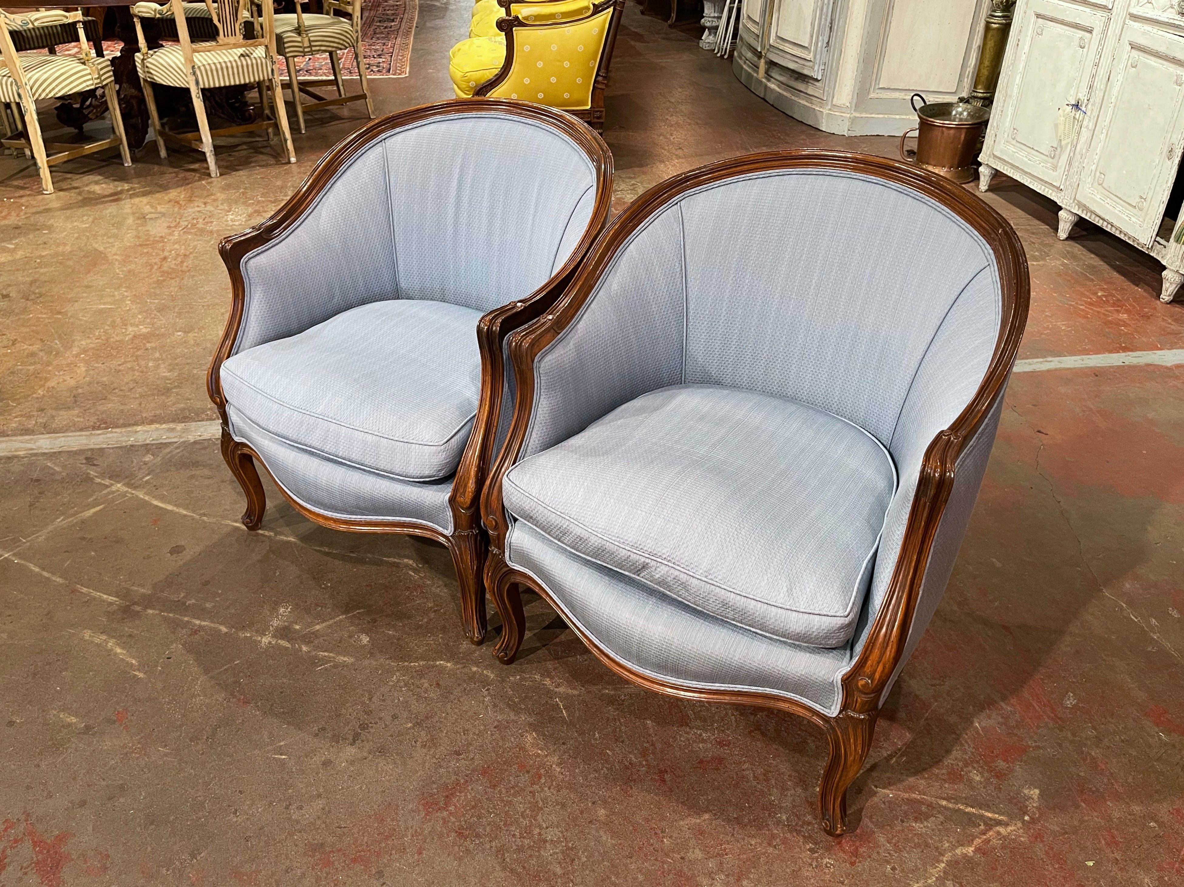 Decorate an office or a study with this elegant pair of antique armchairs; crafted in France circa 1920, the 