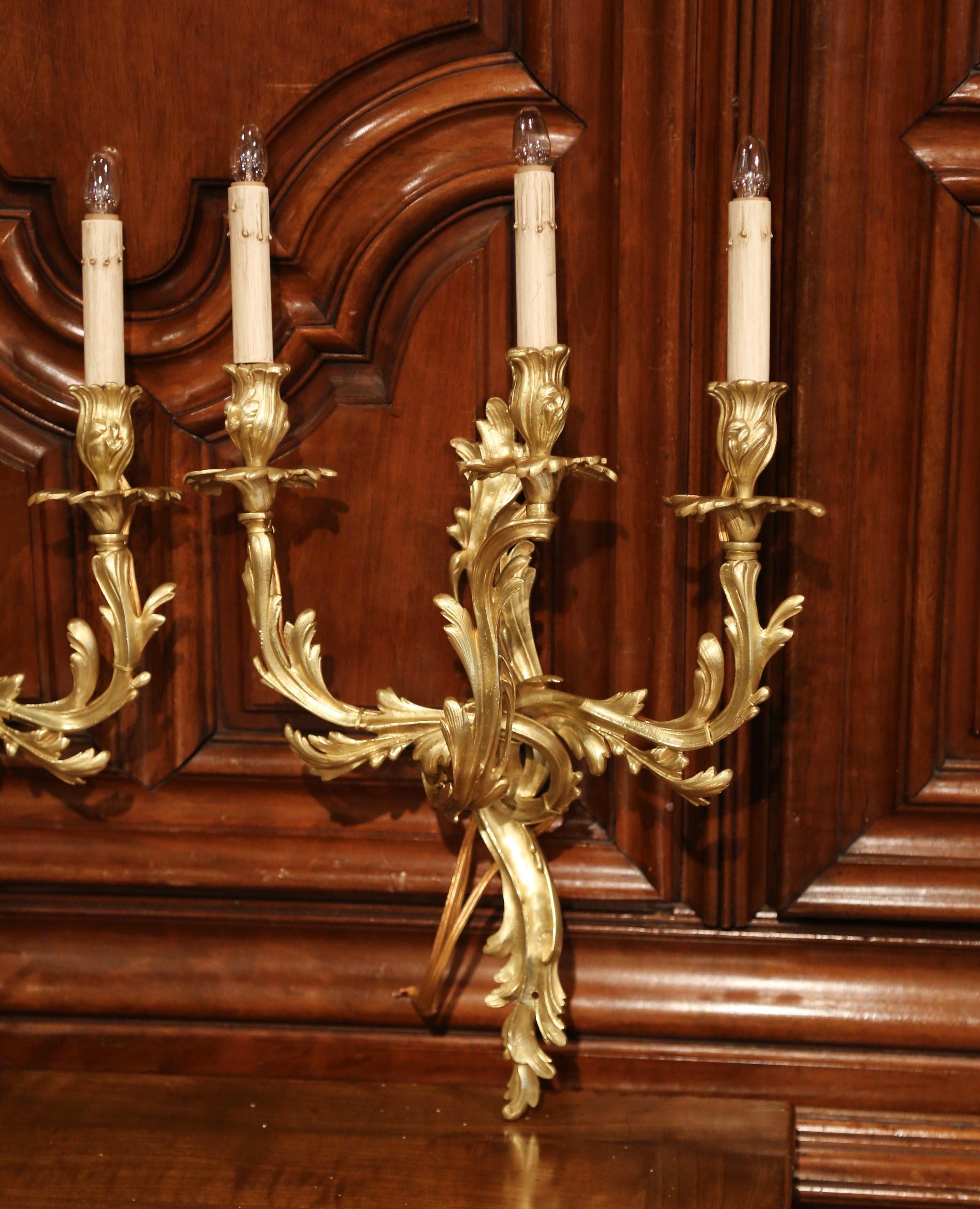 Pair of Early 20th Century French Louis XV Three-Light Gilt Bronze Wall Sconces In Excellent Condition In Dallas, TX