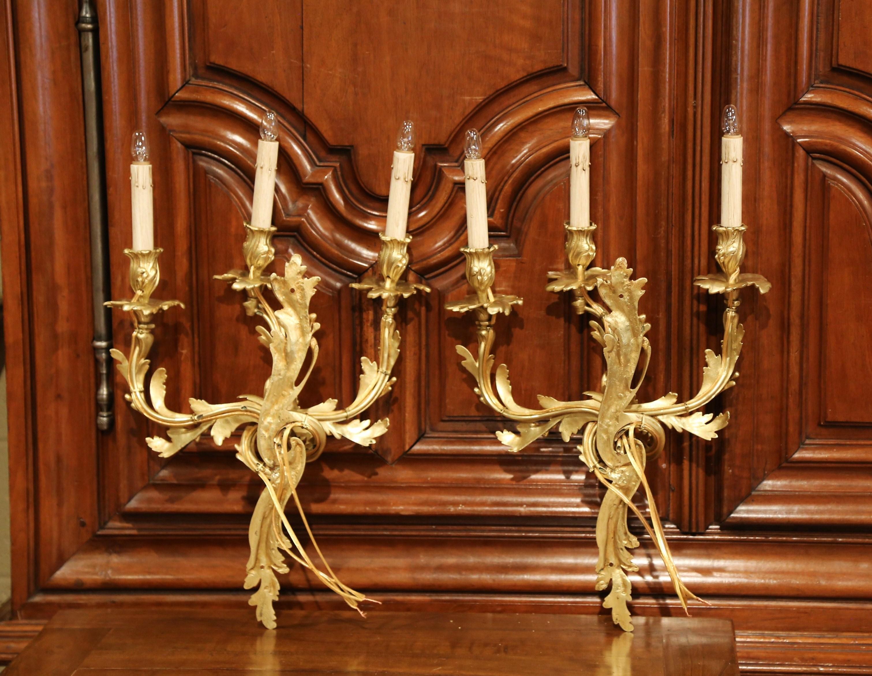Pair of Early 20th Century French Louis XV Three-Light Gilt Bronze Wall Sconces 1