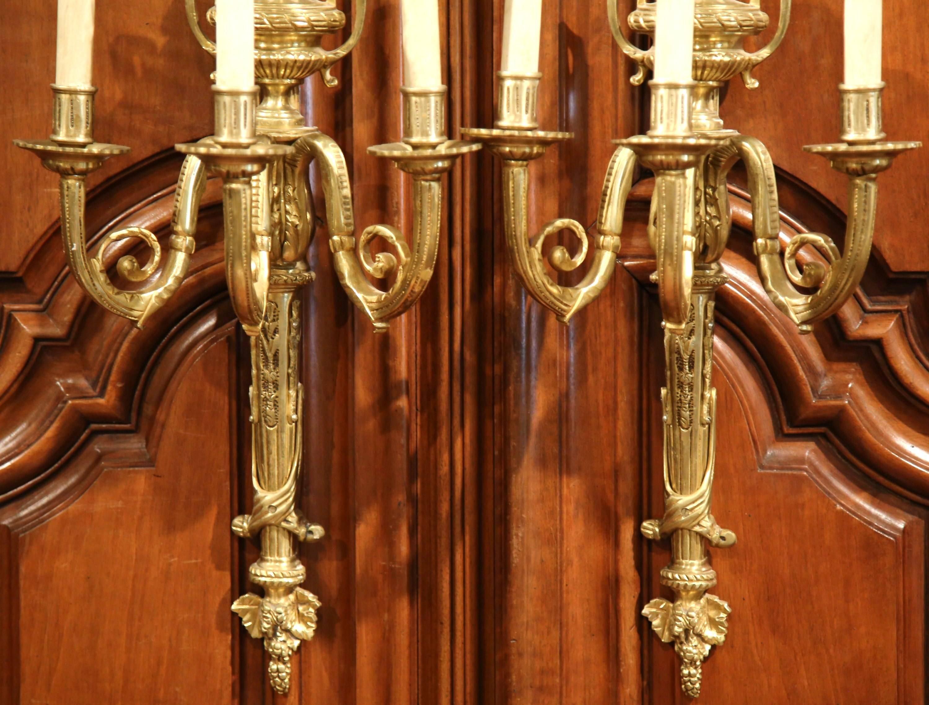 Gilt Pair of Early 20th Century French Louis XVI Bronze Dore Three-Light Wall Sconces