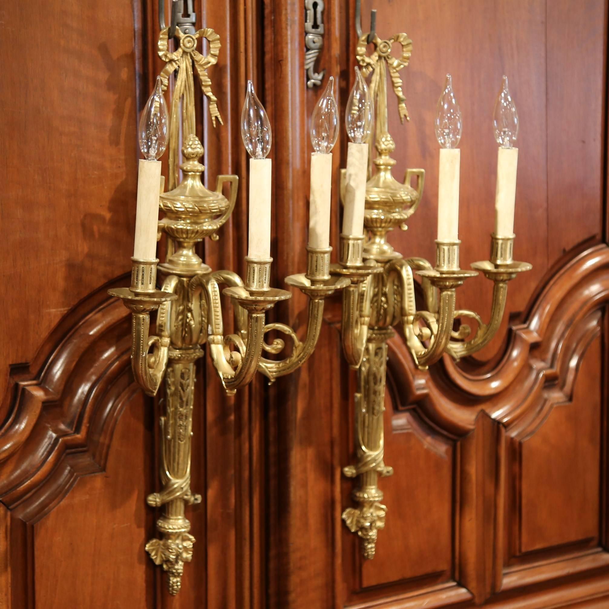 Pair of Early 20th Century French Louis XVI Bronze Dore Three-Light Wall Sconces In Excellent Condition In Dallas, TX