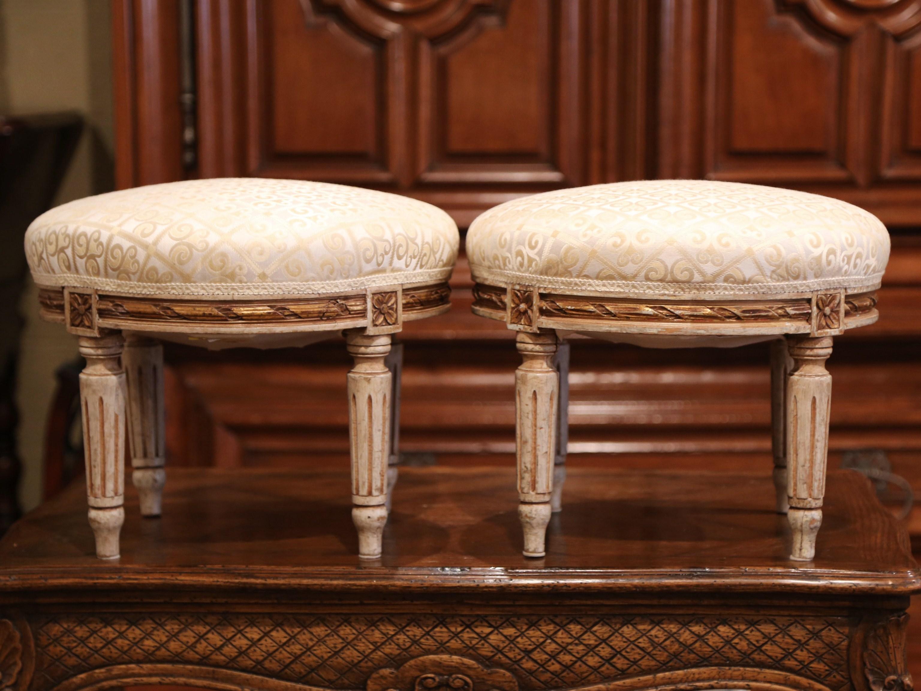 Pair of Early 20th Century French Louis XVI Carved Painted and Gilt Footstools 1