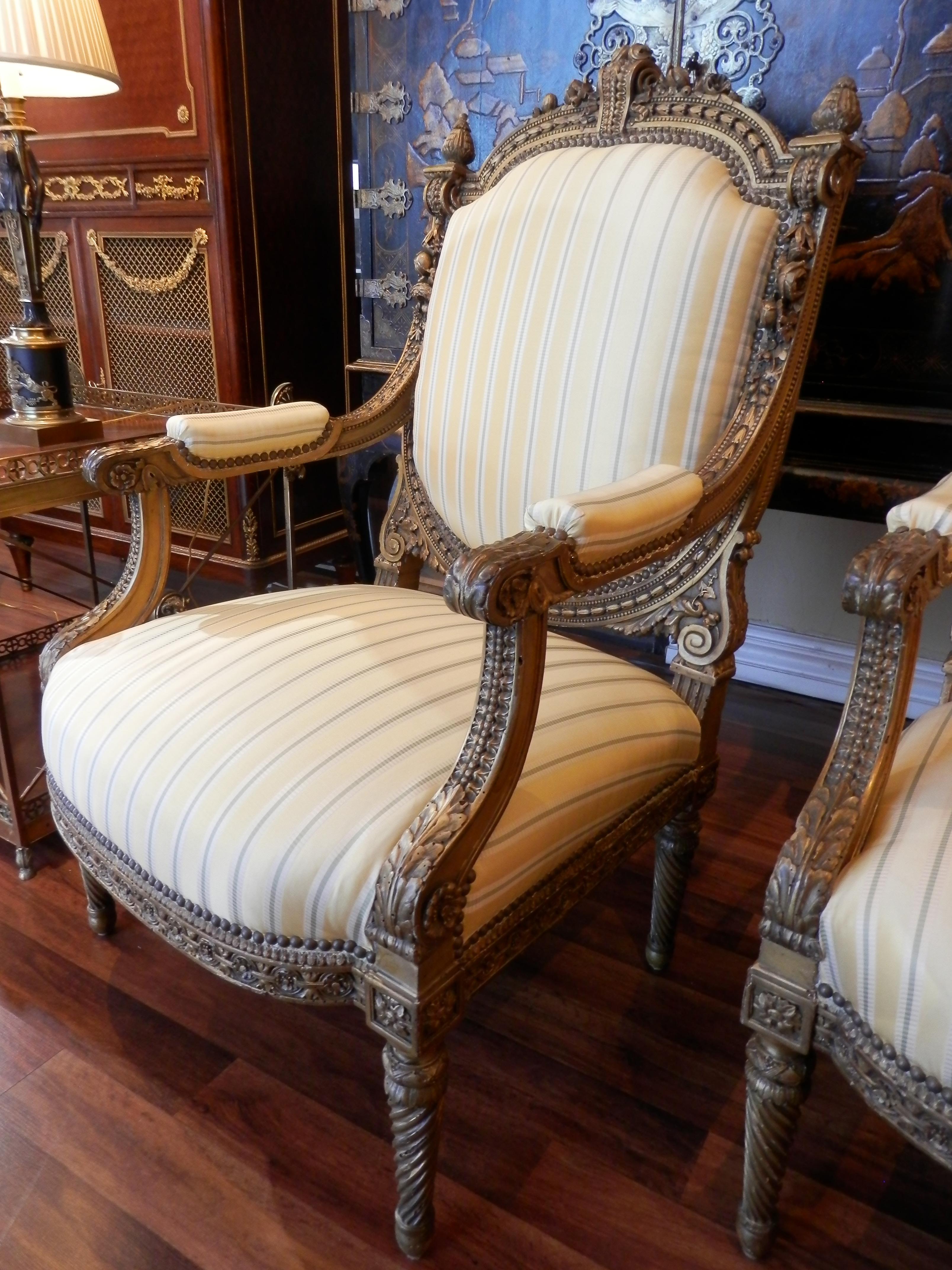 Carved Pair of Early 20th Century French Louis XVI Gilt Large Open Armchairs