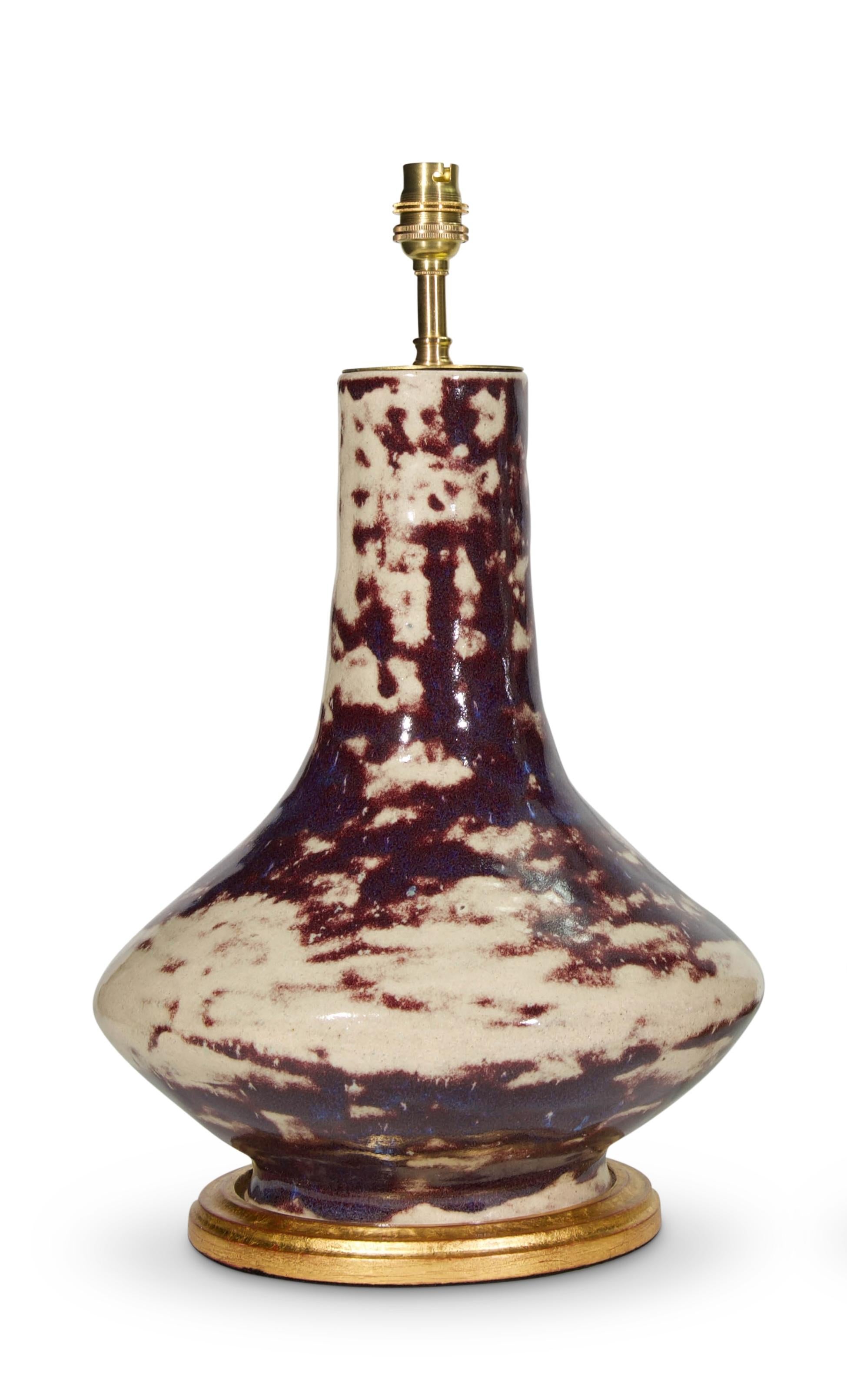 Porcelaine Paire de lampes de table antiques Sang de Bœuf du début du 20ème siècle, de fabrication française et tachetées en vente