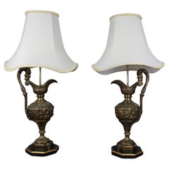 Pair of Early 20th Century French Neoclassical Ewer Lamps with Putti Relief